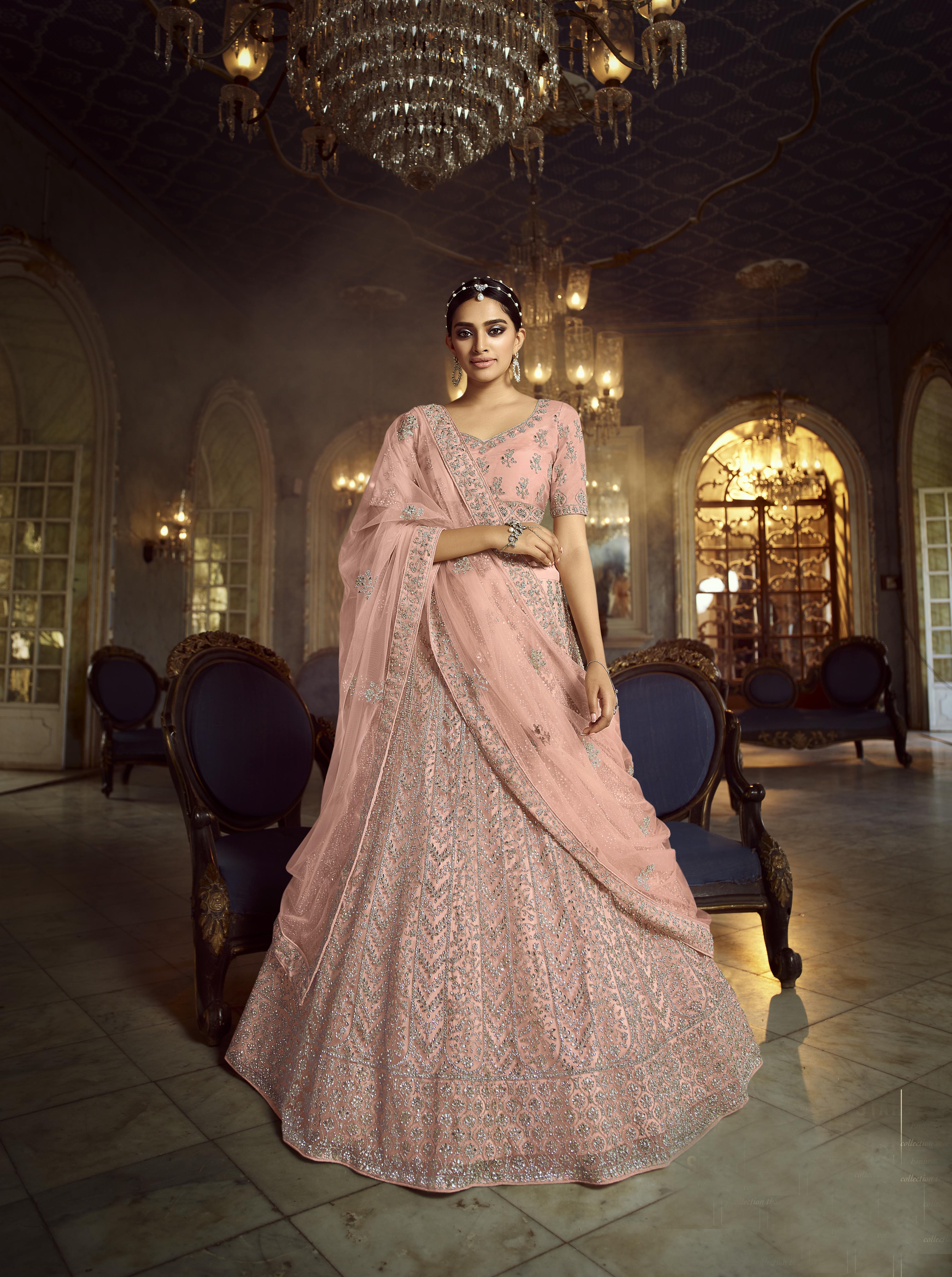 Peach Zarkan Embroidered Semi Stitched Net Lehenga-Choli with Stone Detailing - FunkyTradition