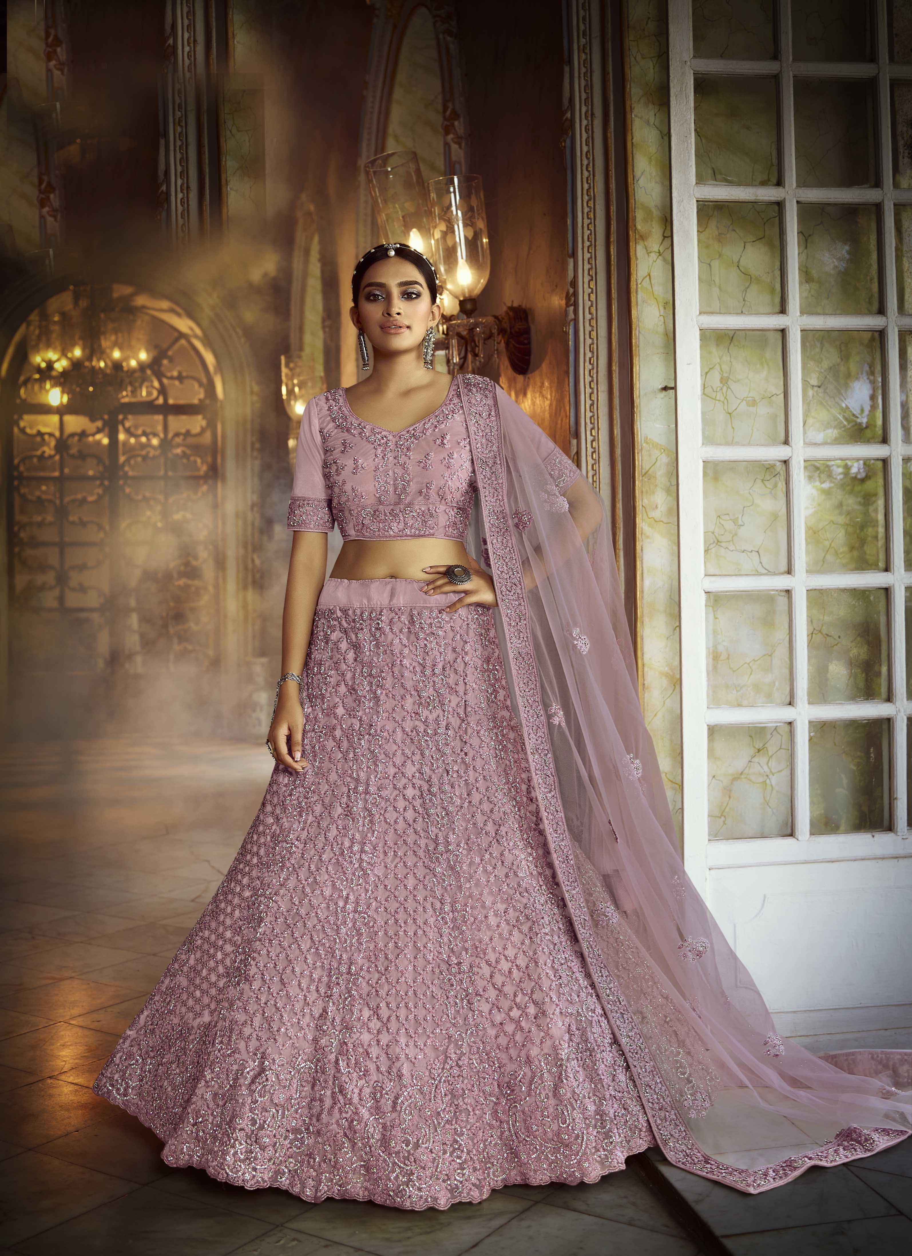 Dusky Pink Embroidered Semi Stitched Lehenga-Choli in Net with Stone Detailing - FunkyTradition