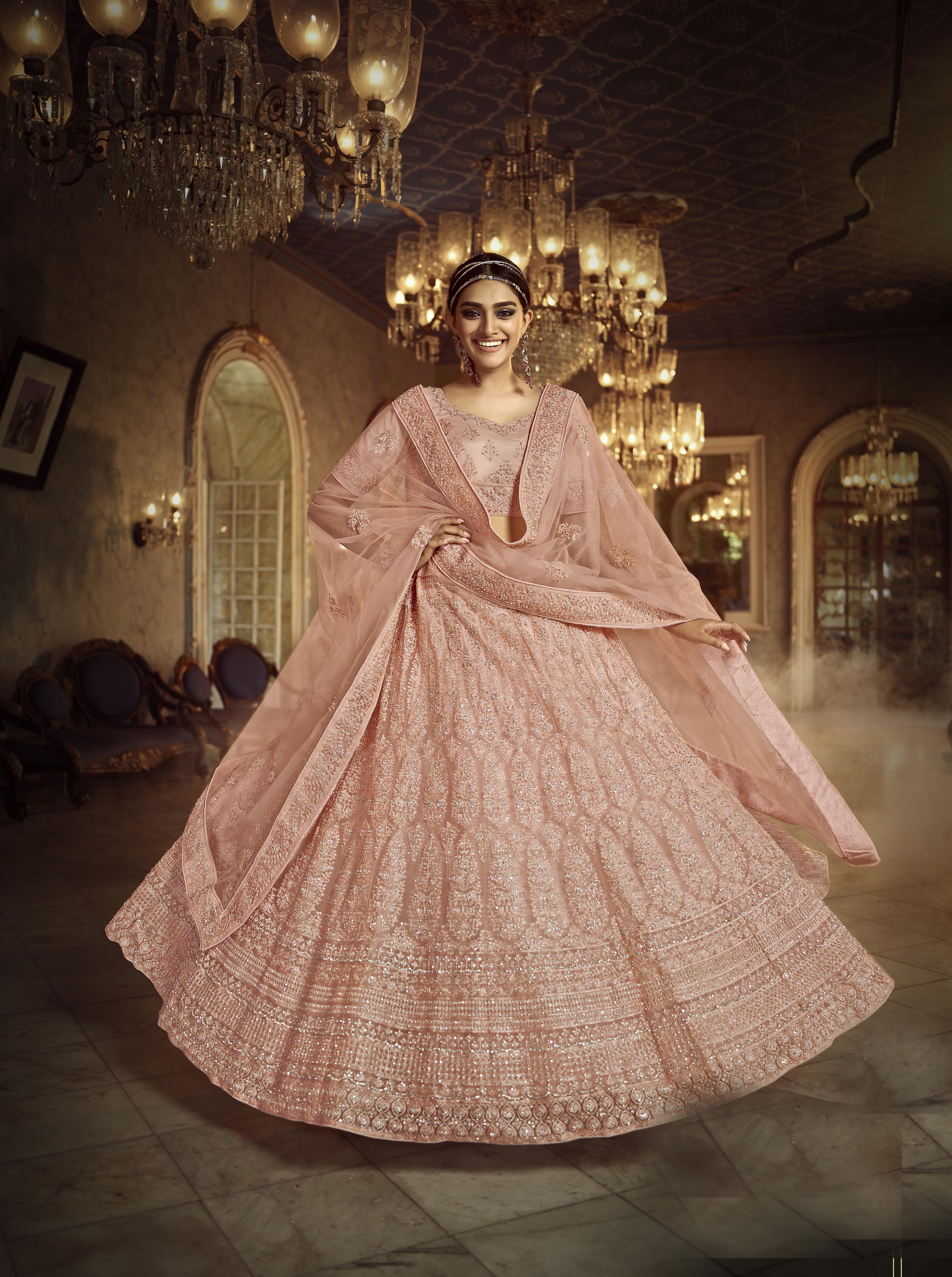 Peach Zarkan Embroidered Semi Stitched Net Lehenga-Choli with Stone Detailing - FunkyTradition