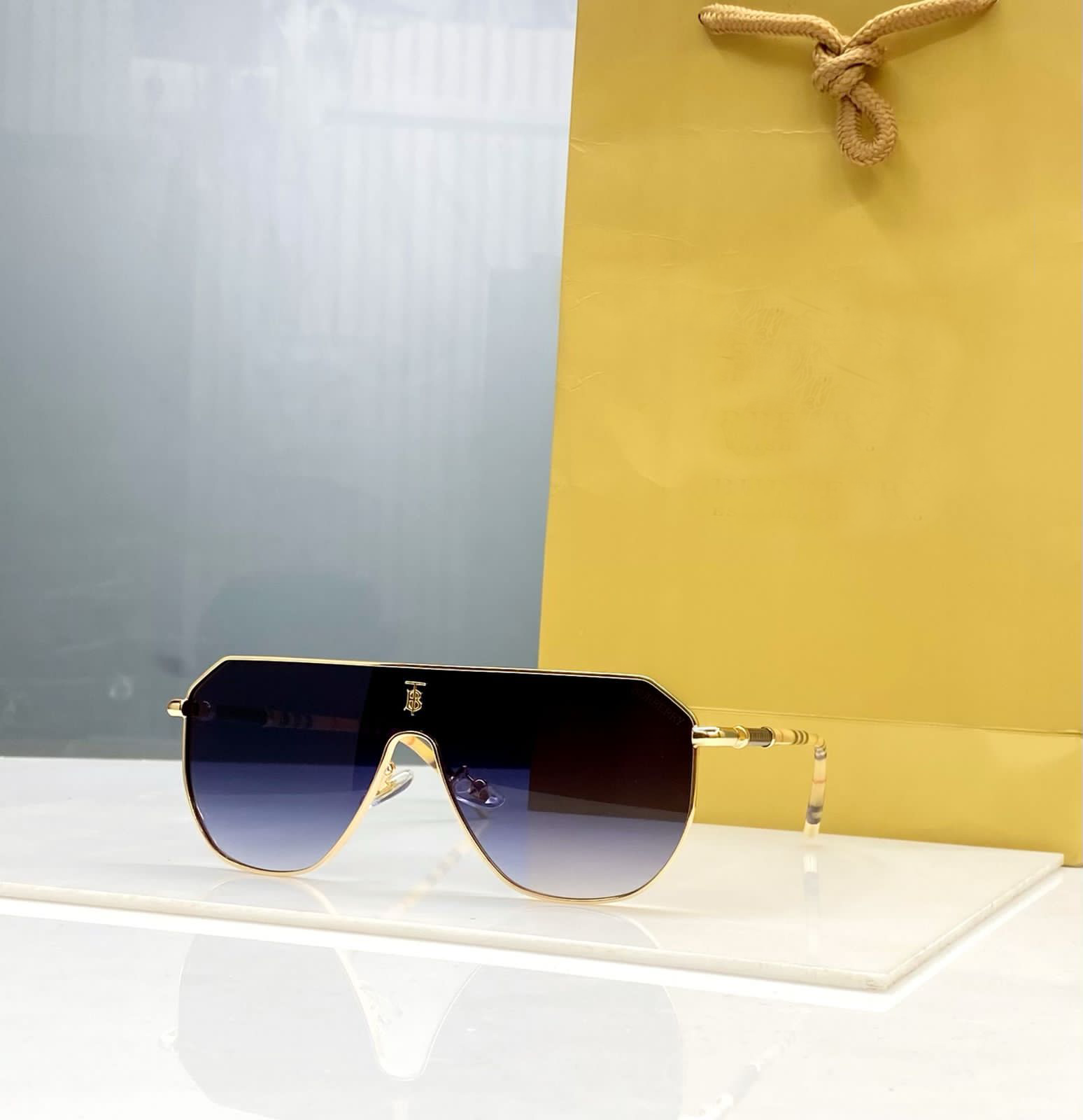 Luxury Check Arm Shield Sunglasses – Gold Frame with Gradient Black Lens