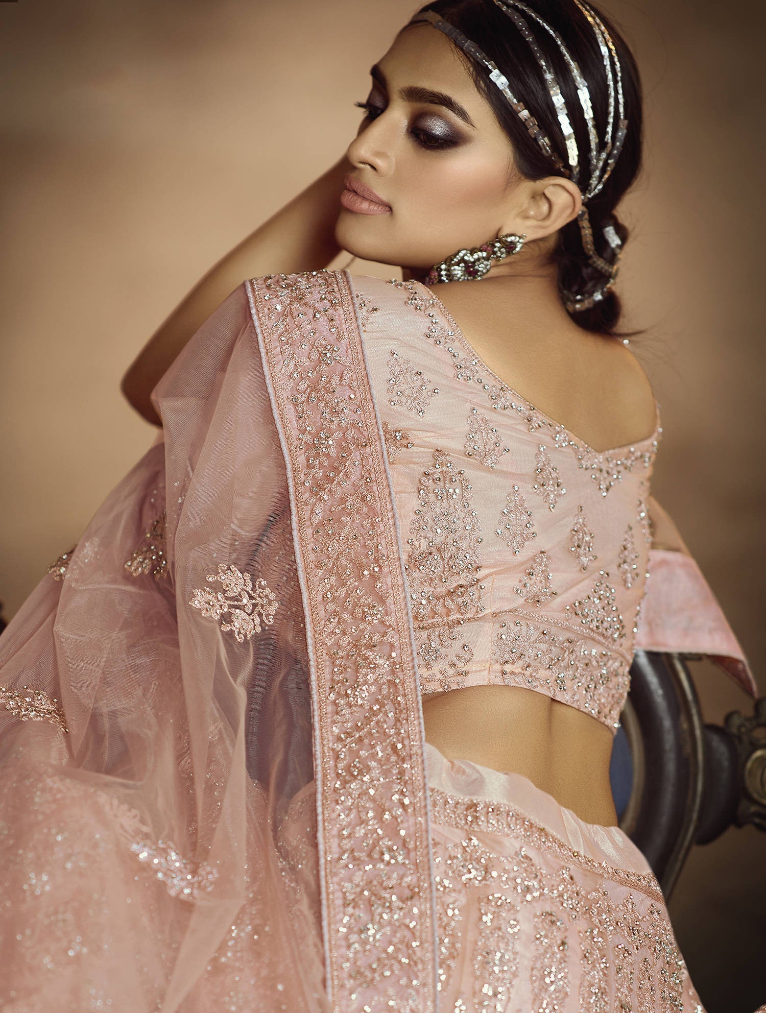 Peach Zarkan Embroidered Semi Stitched Net Lehenga-Choli with Stone Detailing - FunkyTradition