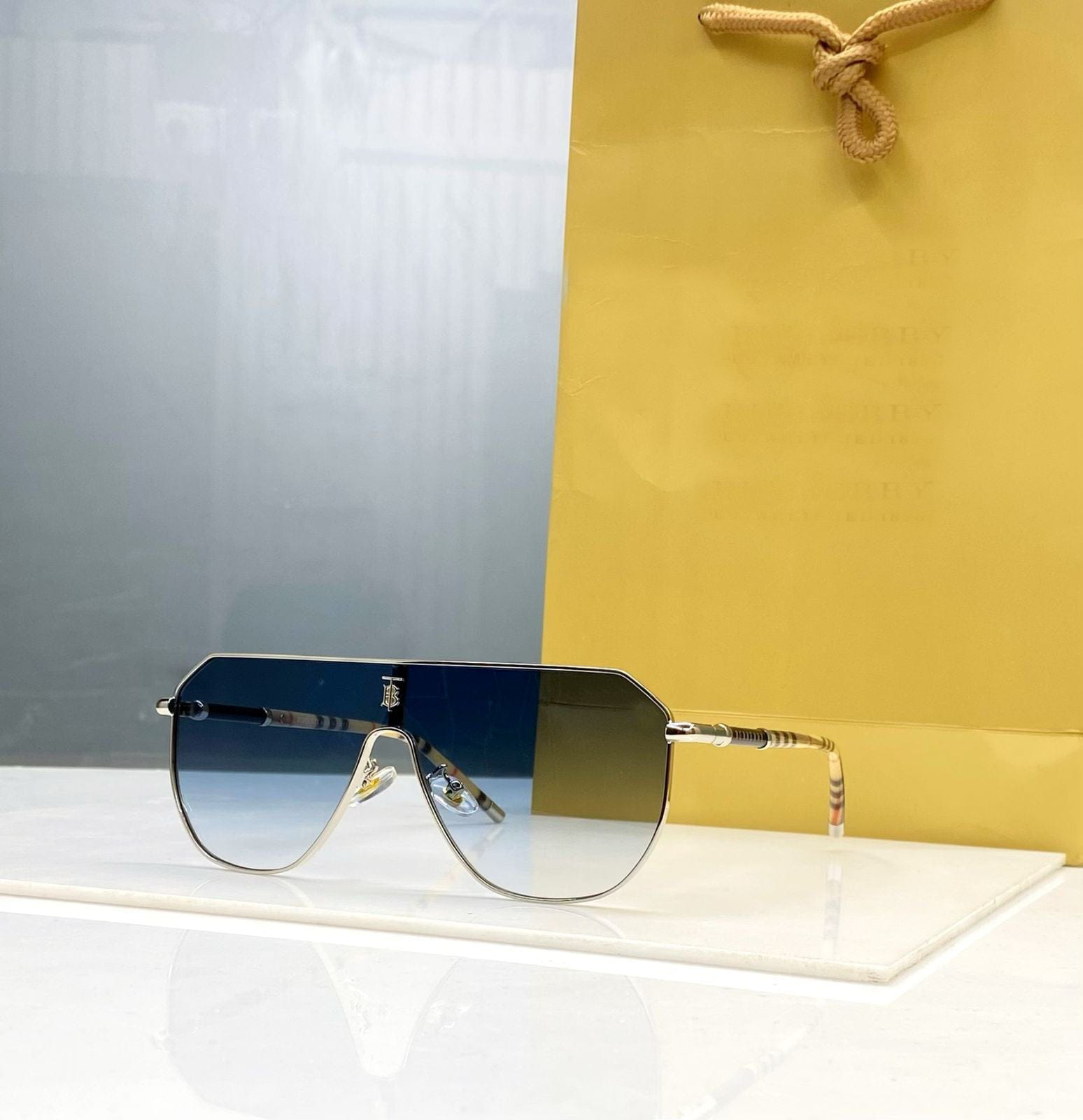 Luxury Check Arm Shield Sunglasses – Gold Frame with Gradient Black Lens