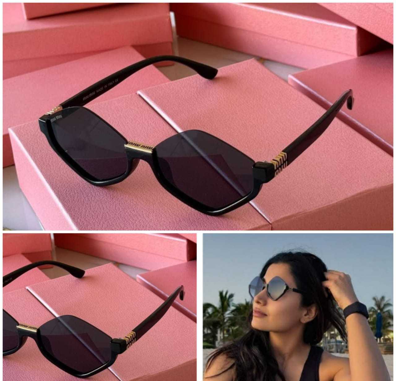 Actress Rashmika Mandanna wearing black diamond-shaped geometric sunglasses.