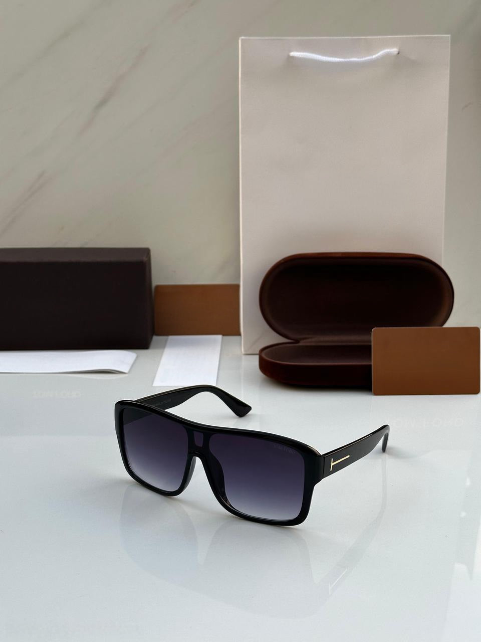 Black Sunglasses Side Angle with Gold Detailing