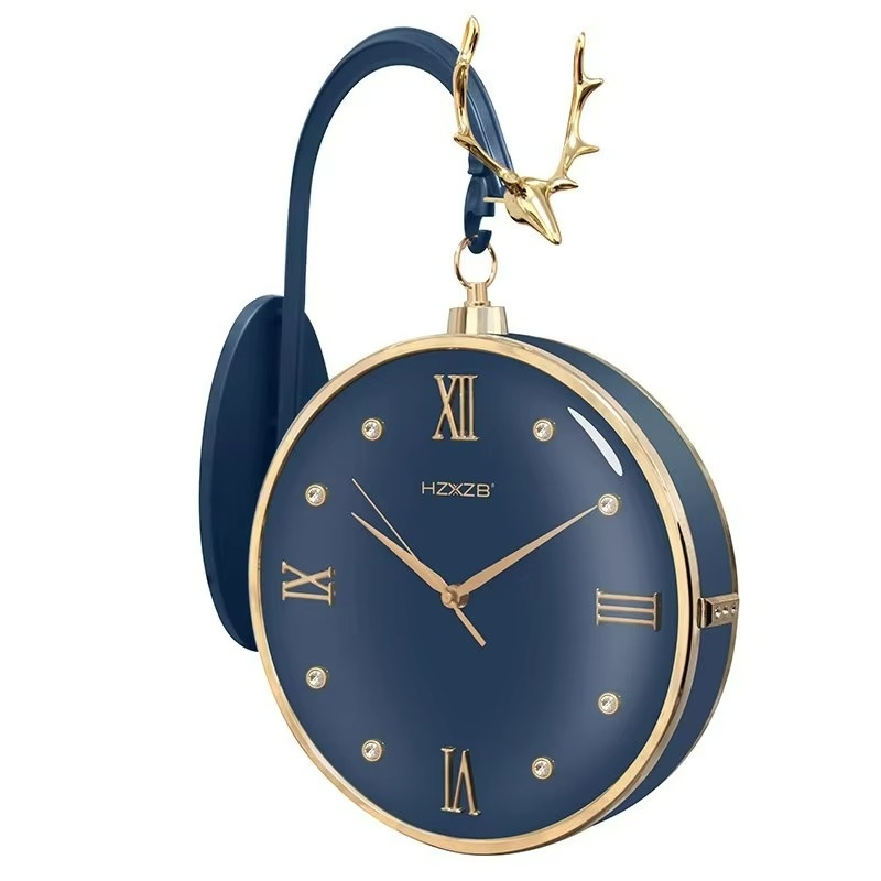 Blue clock with gold accents and deer antler design on a white background