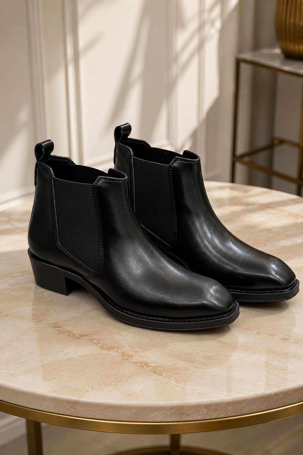 Classic Chelsea boot design with elastic side panels