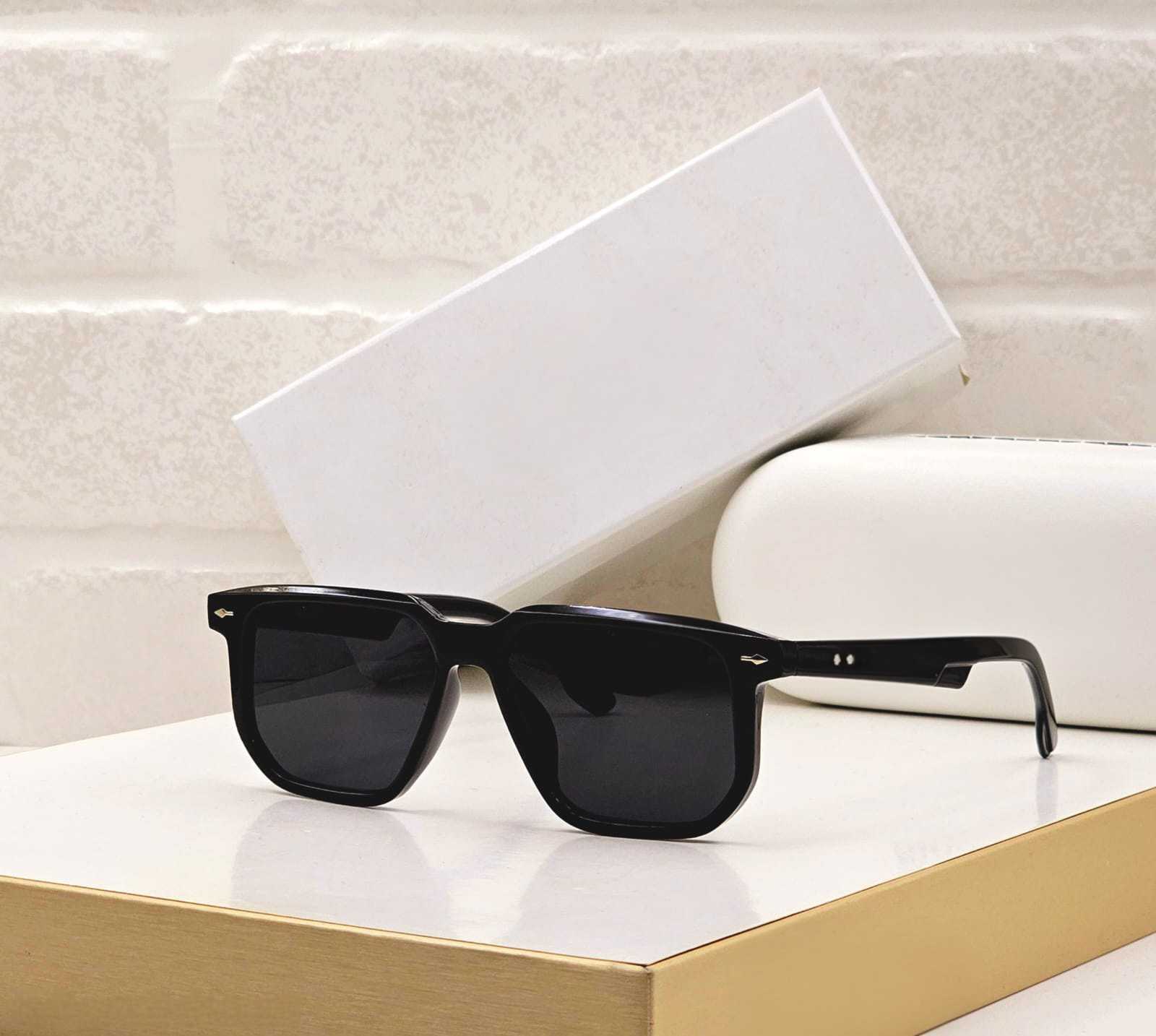 Classic solid black rectangular sunglasses with dark lenses