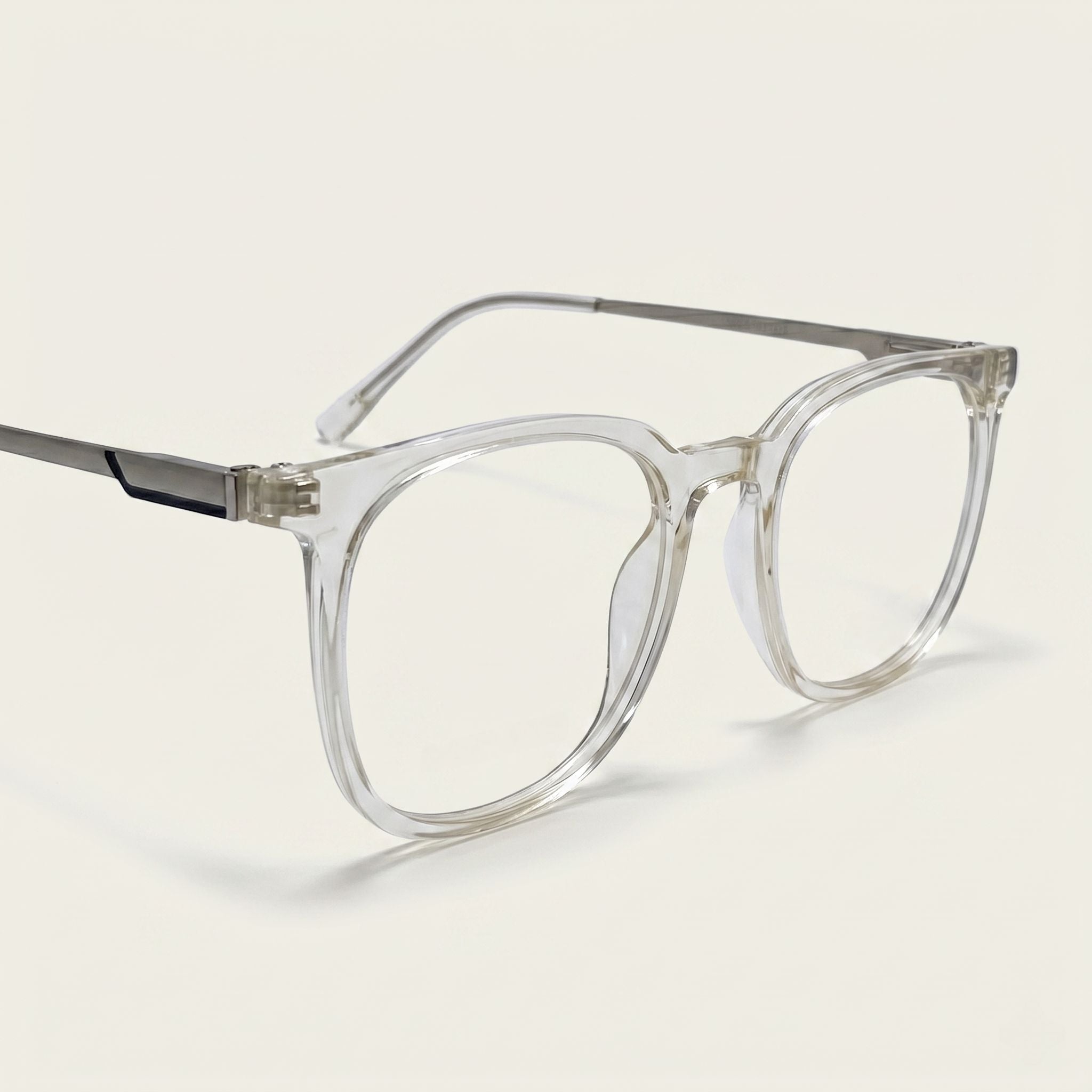 Clear eyeglasses with a light gray frame on a white background