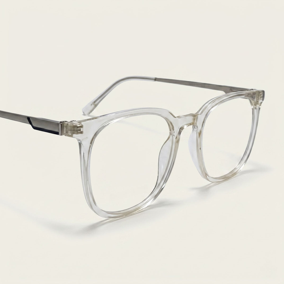 Clear eyeglasses with a light gray frame on a white background