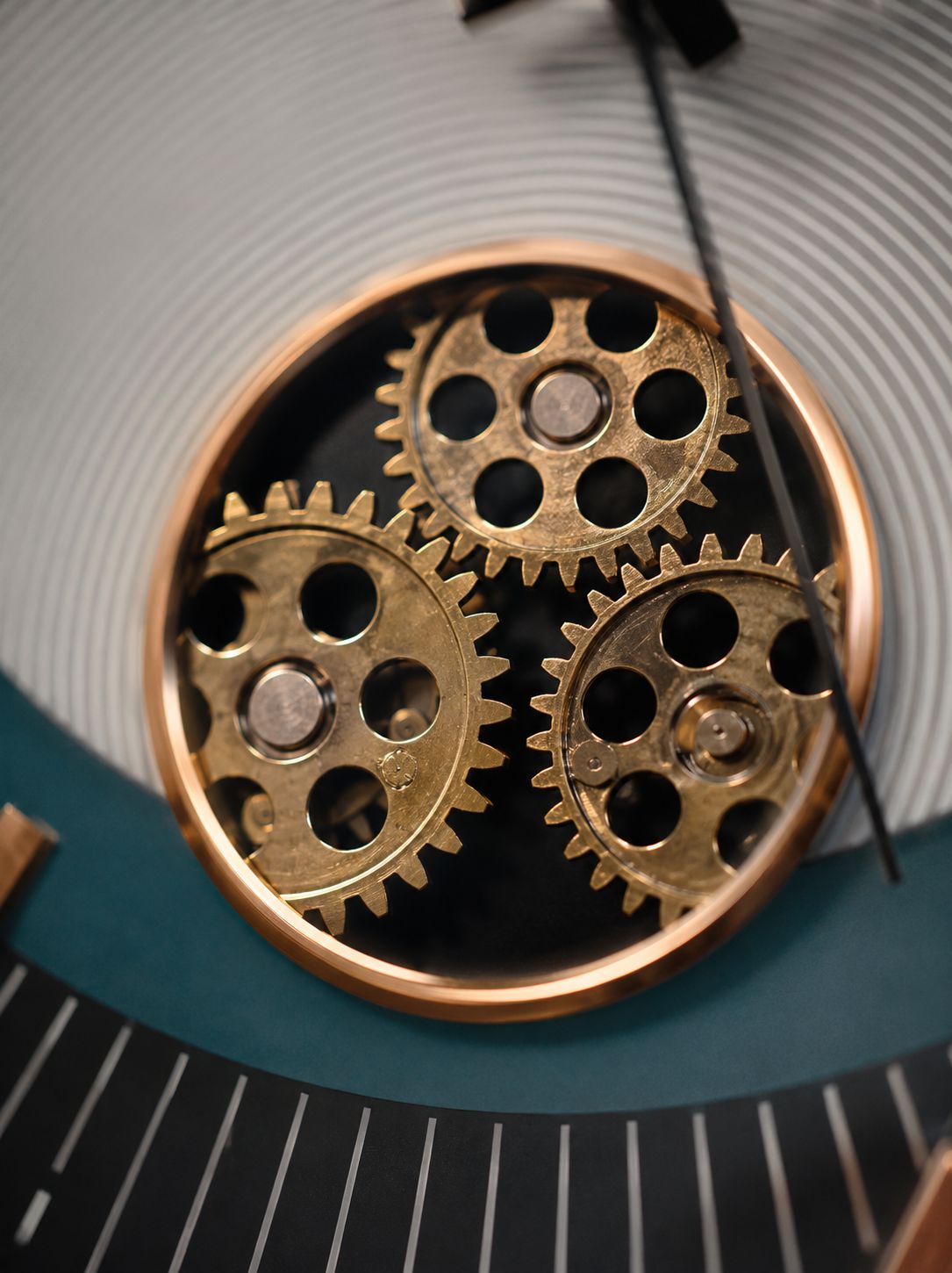 Close-Up of Working Decorative Gears in Luxury Rose Gold Wall Clock