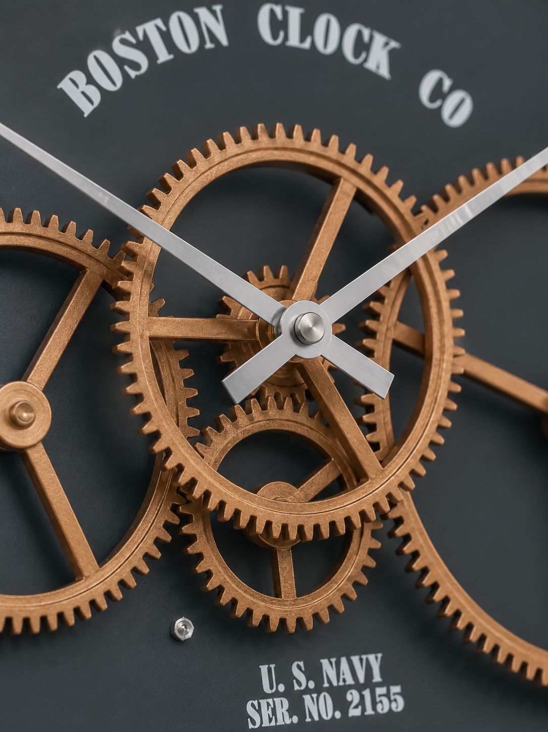 Close-up detail of rotating bronze gears and premium craftsmanship