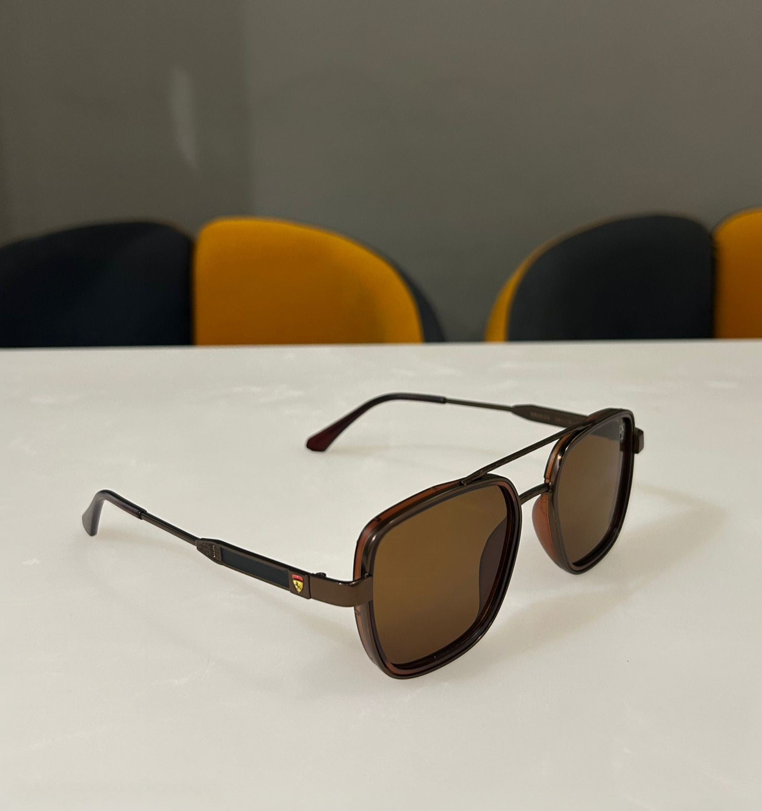 Close-up of Brown Square Sunglasses, showing frame temple and comfortable fit.