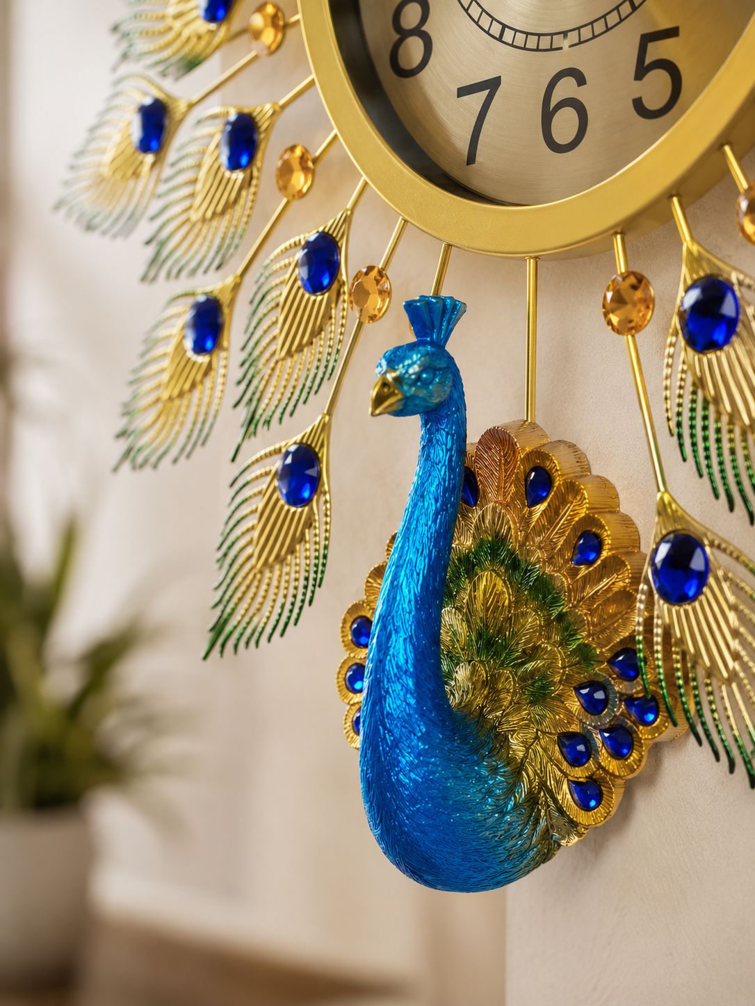 Close-up of handcrafted ceramic peacock body and premium metal feather detailing