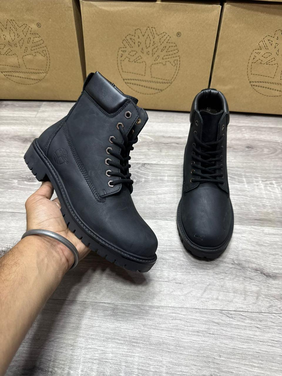 Close-up of high-quality black suede faux leather texture on FunkyTradition boot.