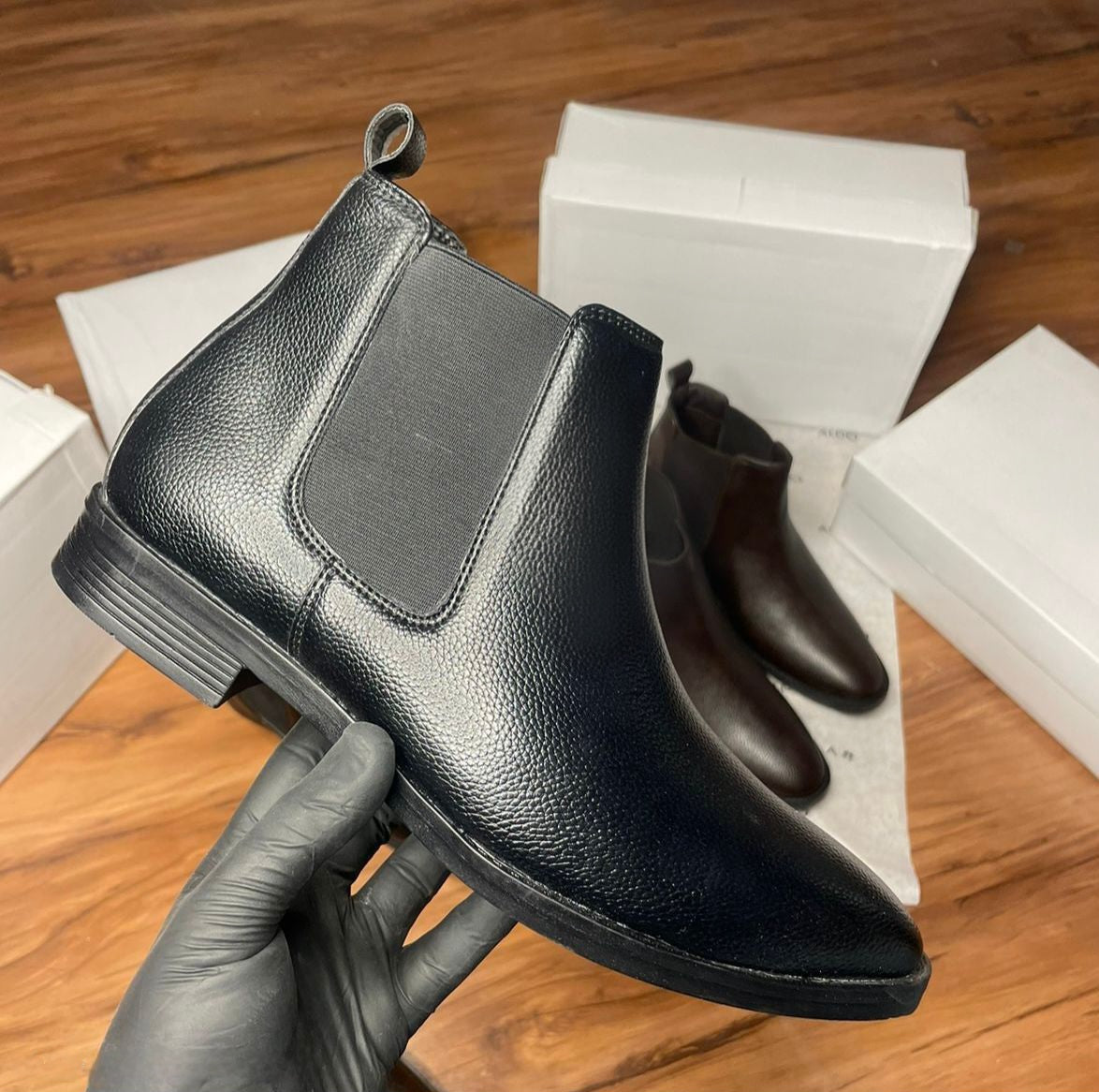 Close-up of high-quality vegan faux suede leather texture on FunkyTradition black ankle boot upper