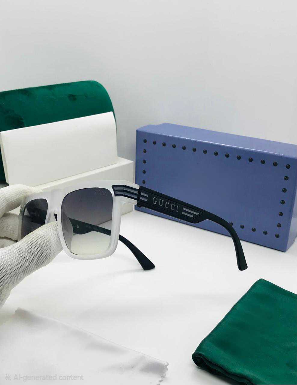 Close-up of white square frame sunglasses, highlighting the gradient lenses and temple details.