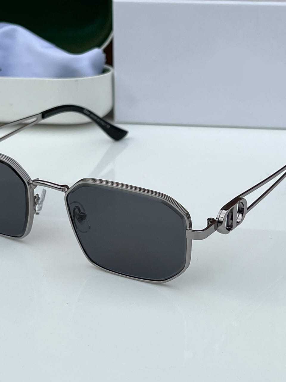Geometric Slim Frame Sunglasses with Sculpted Side Detail - FunkyTradition