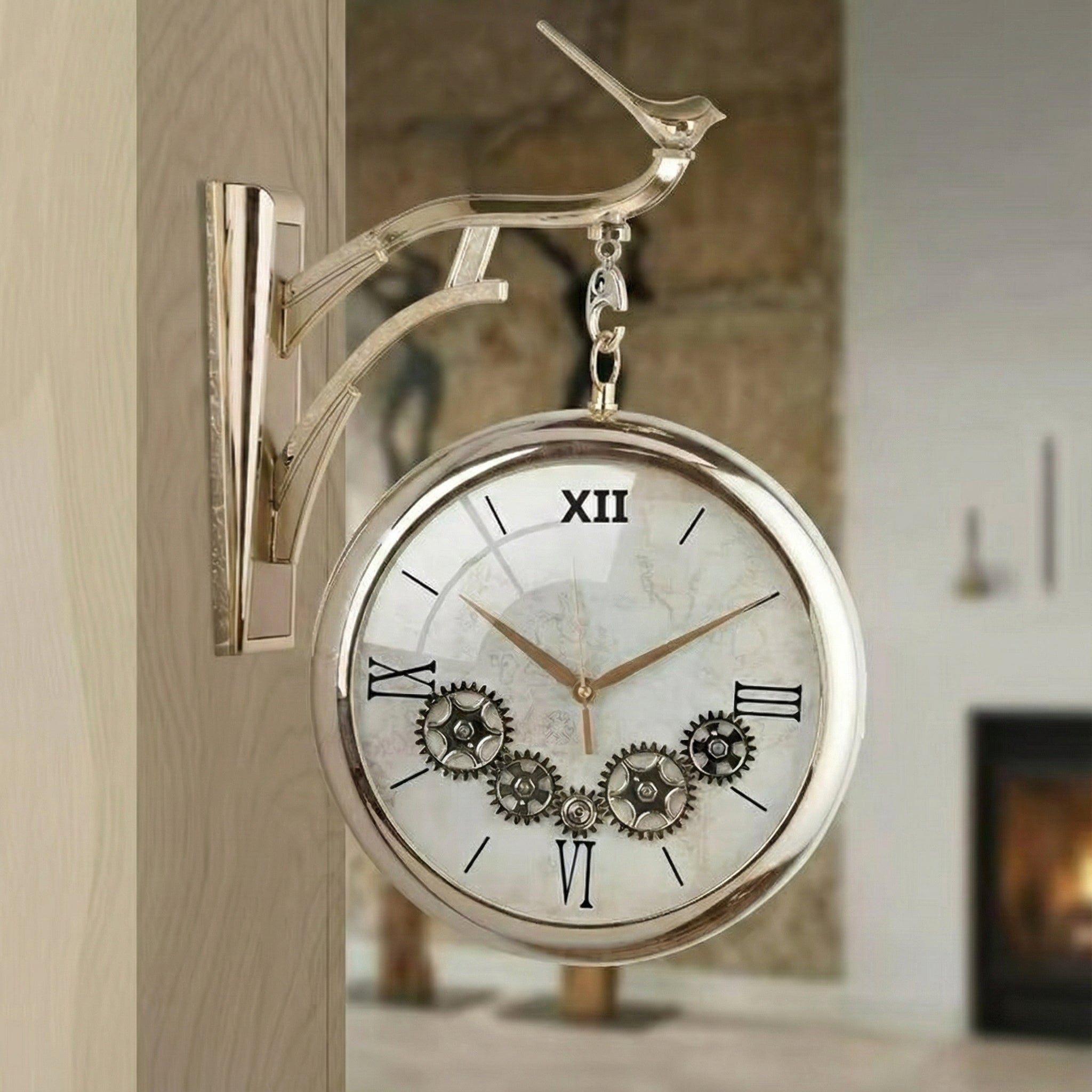 Close up of cream vintage wall clock with roman numerals and gear design.