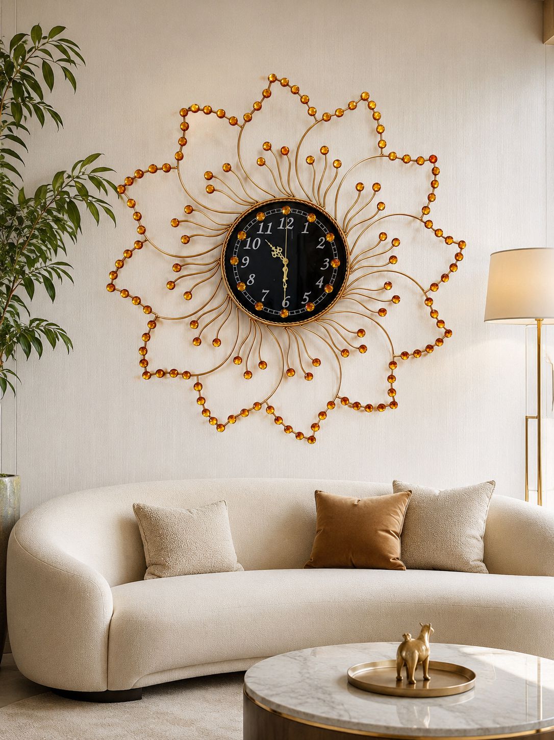 Decorative crystal flower wall clock above sofa creating a statement wall décor