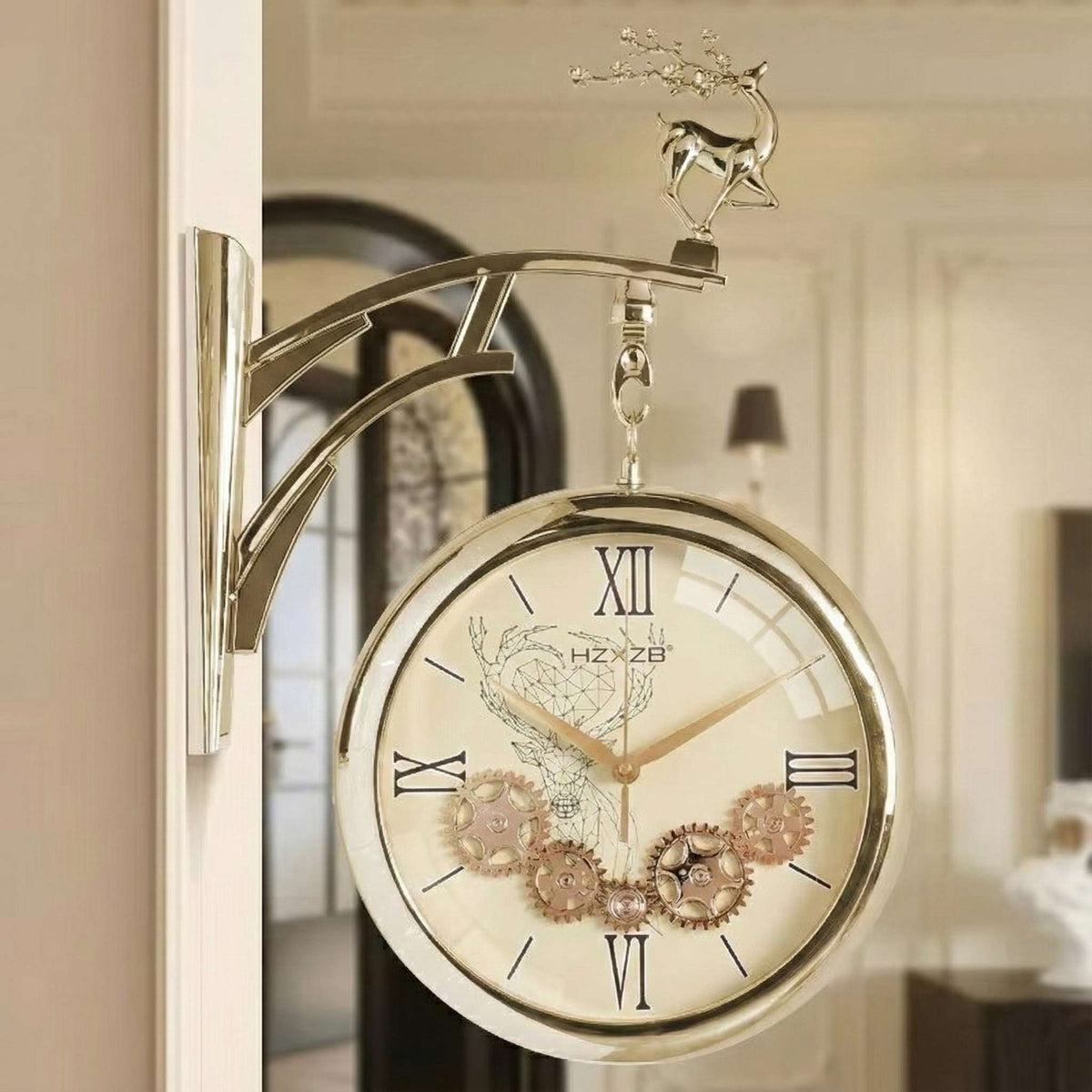 Decorative wall clock with gear design and deer figurine on a blurred background