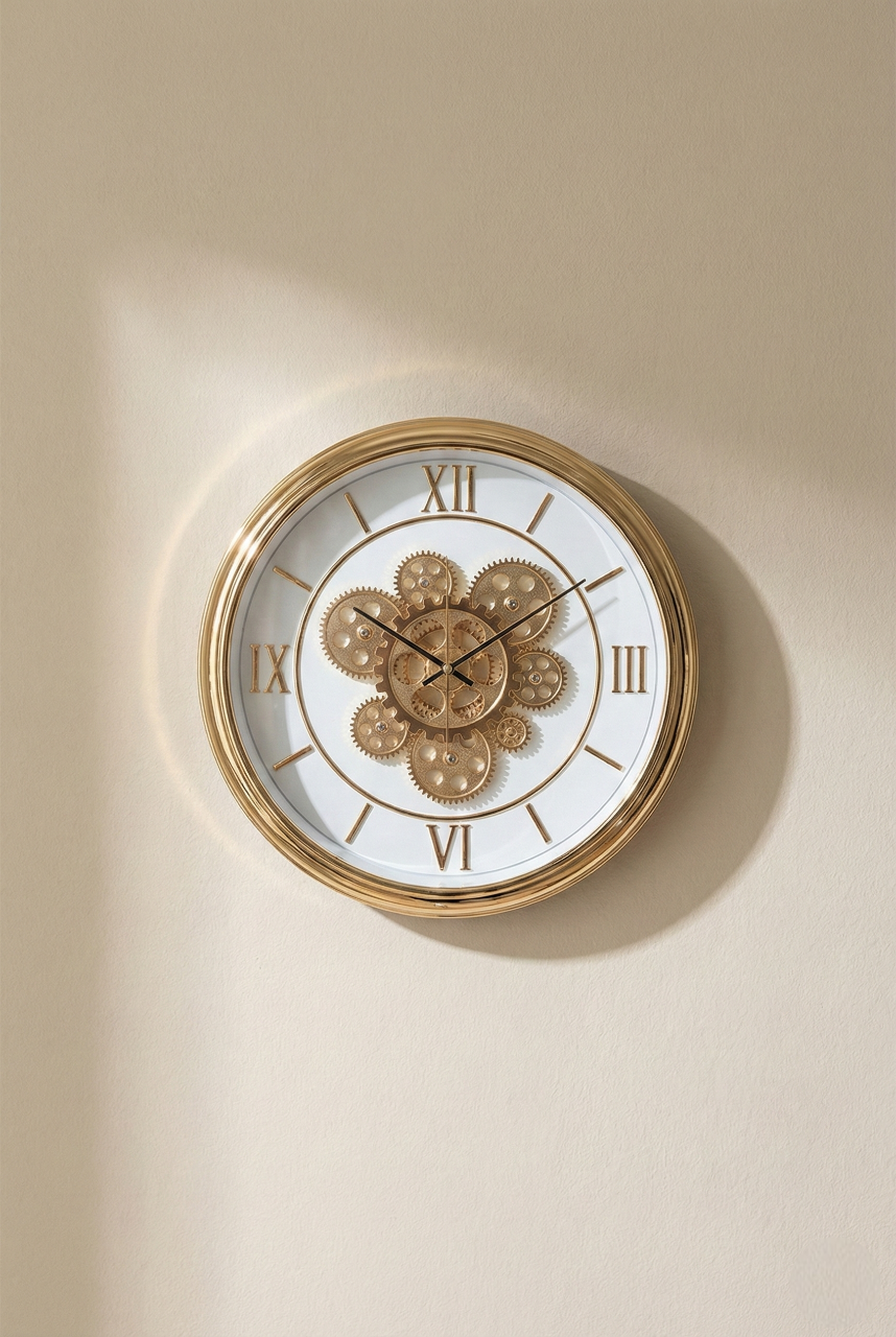 Decorative wall clock with gold frame and white face on a beige wall