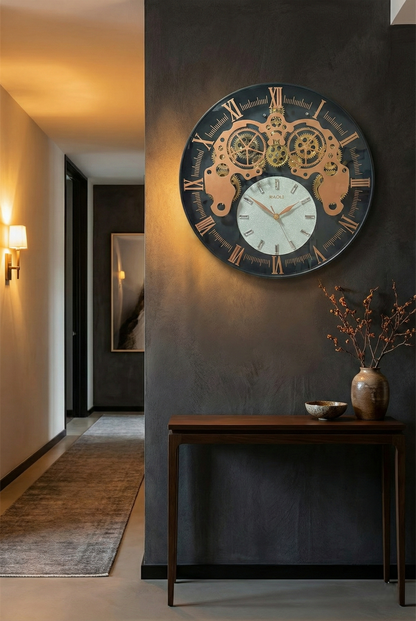 Decorative wall clock with mechanical design on a dark wall in a room with a table and lamp.
