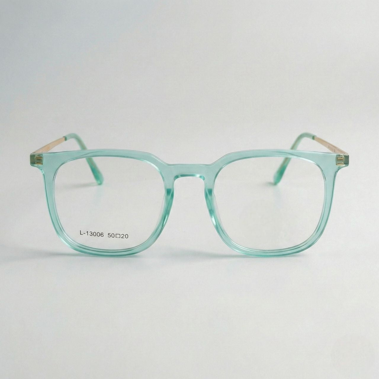 Front view of transparent mint green square eyeglasses for men and women