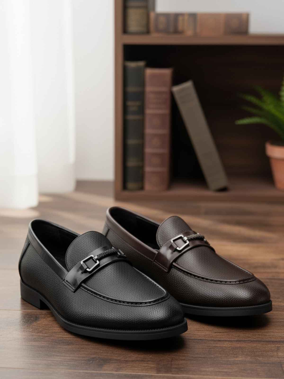 FunkyTradition Men's Black and Brown Tassel Loafer Shoes pair on a wooden background.