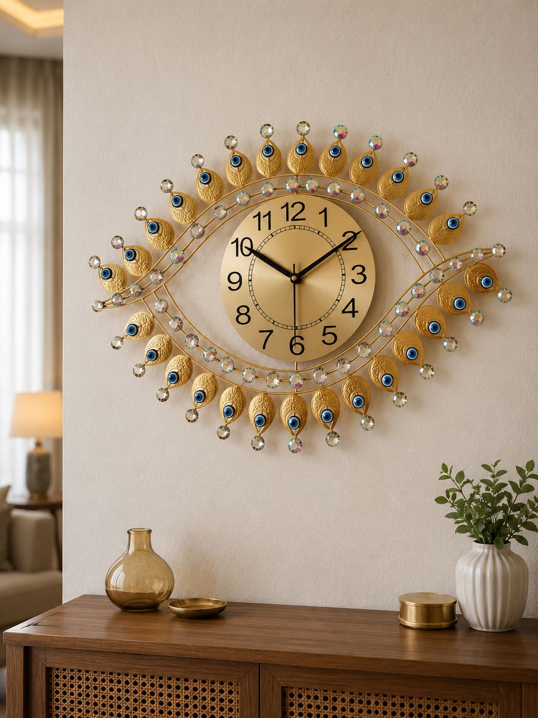 Gold Nazar inspired metal wall clock with blue eye detailing displayed on living room console