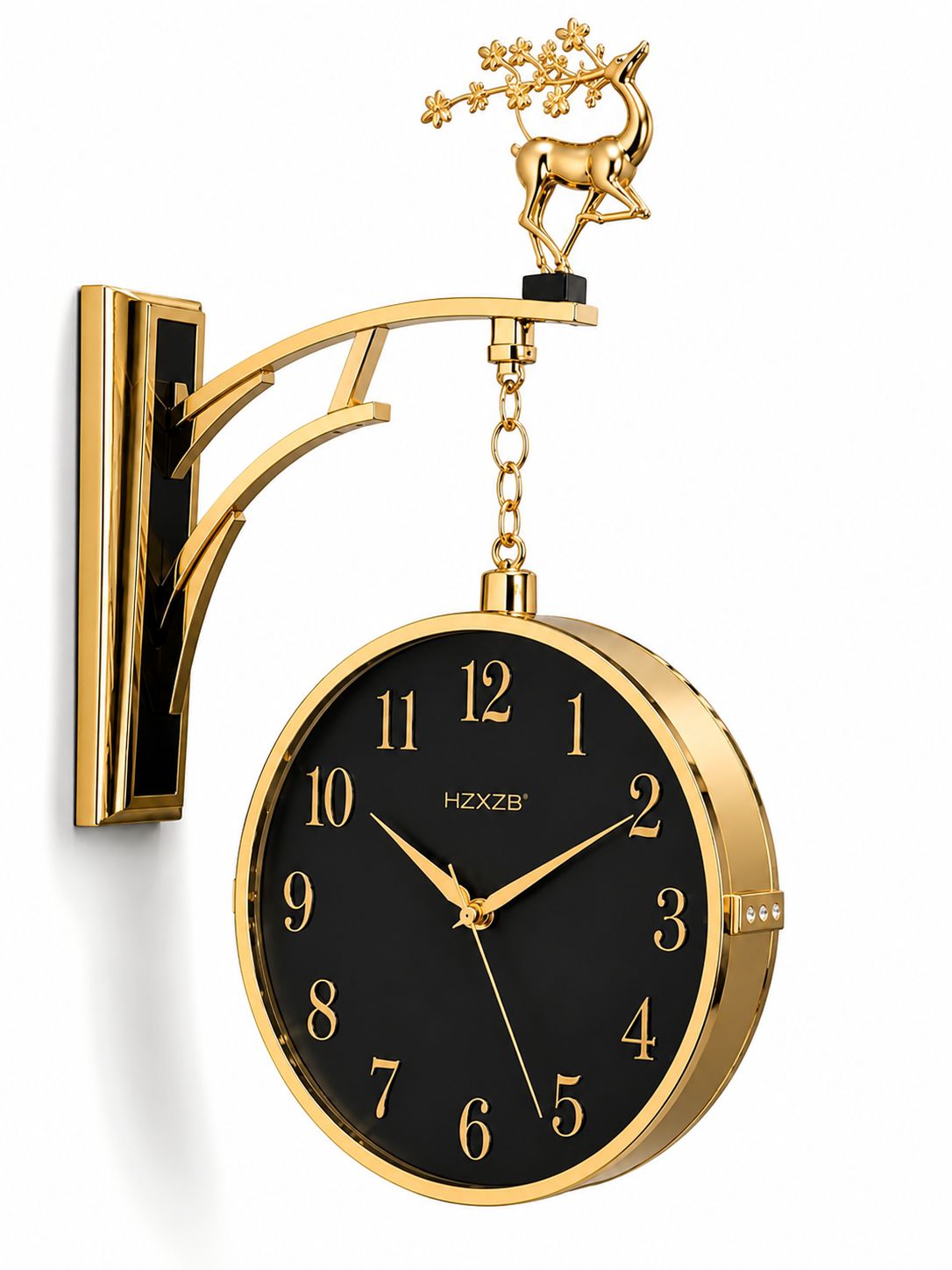 Gold wall clock with a black face, gold numerals and hands, mounted on a decorative gold bracket with a deer finial, shown against a white background.