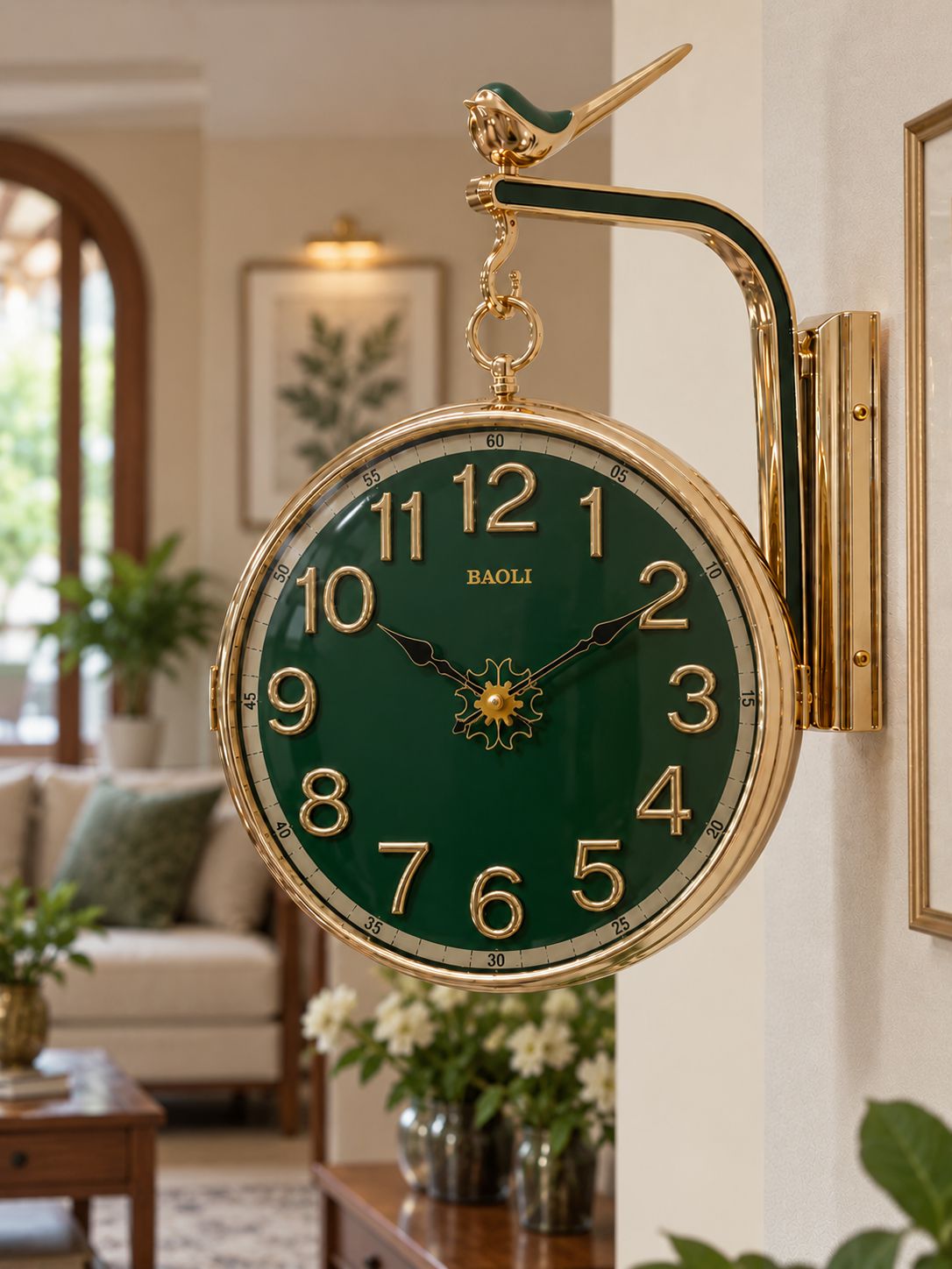 Green dual-sided rotating wall clock with Arabic numerals and premium gold-tone detailing