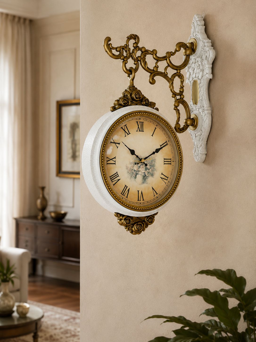 Ivory white ornate wall clock with Roman numeral face and antique gold floral accents