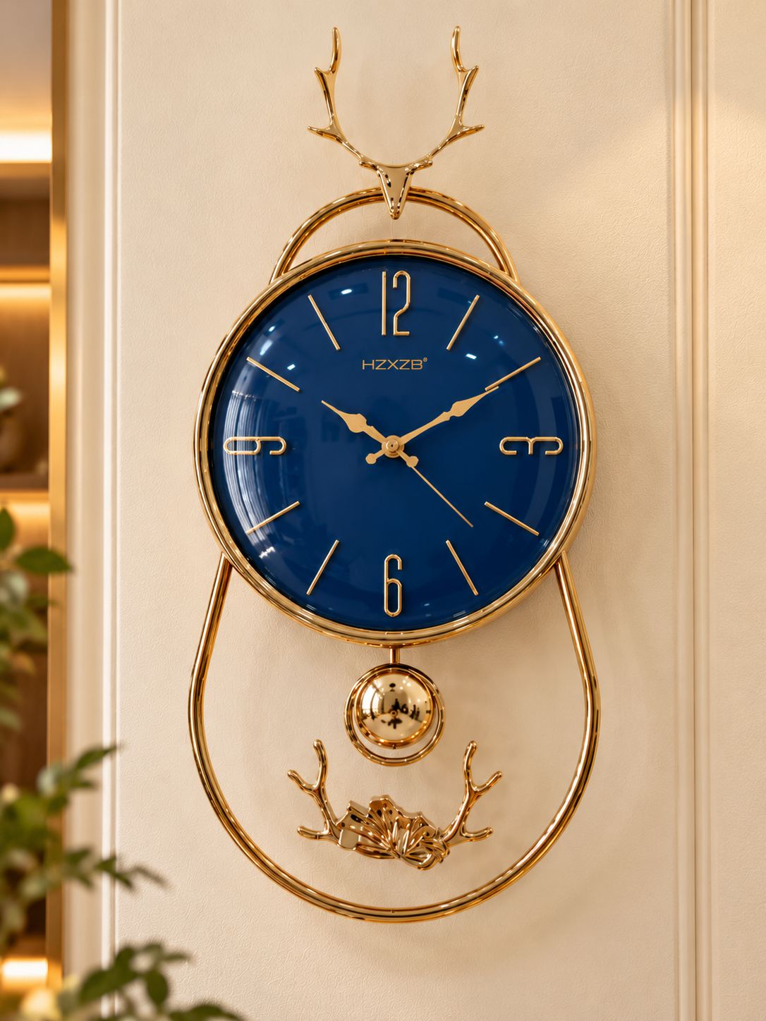 FunkyTradition Reindeer Pendulum Wall Clock – Gold Decorative Wall Clock with Working Pendulum | White, Blue & Green