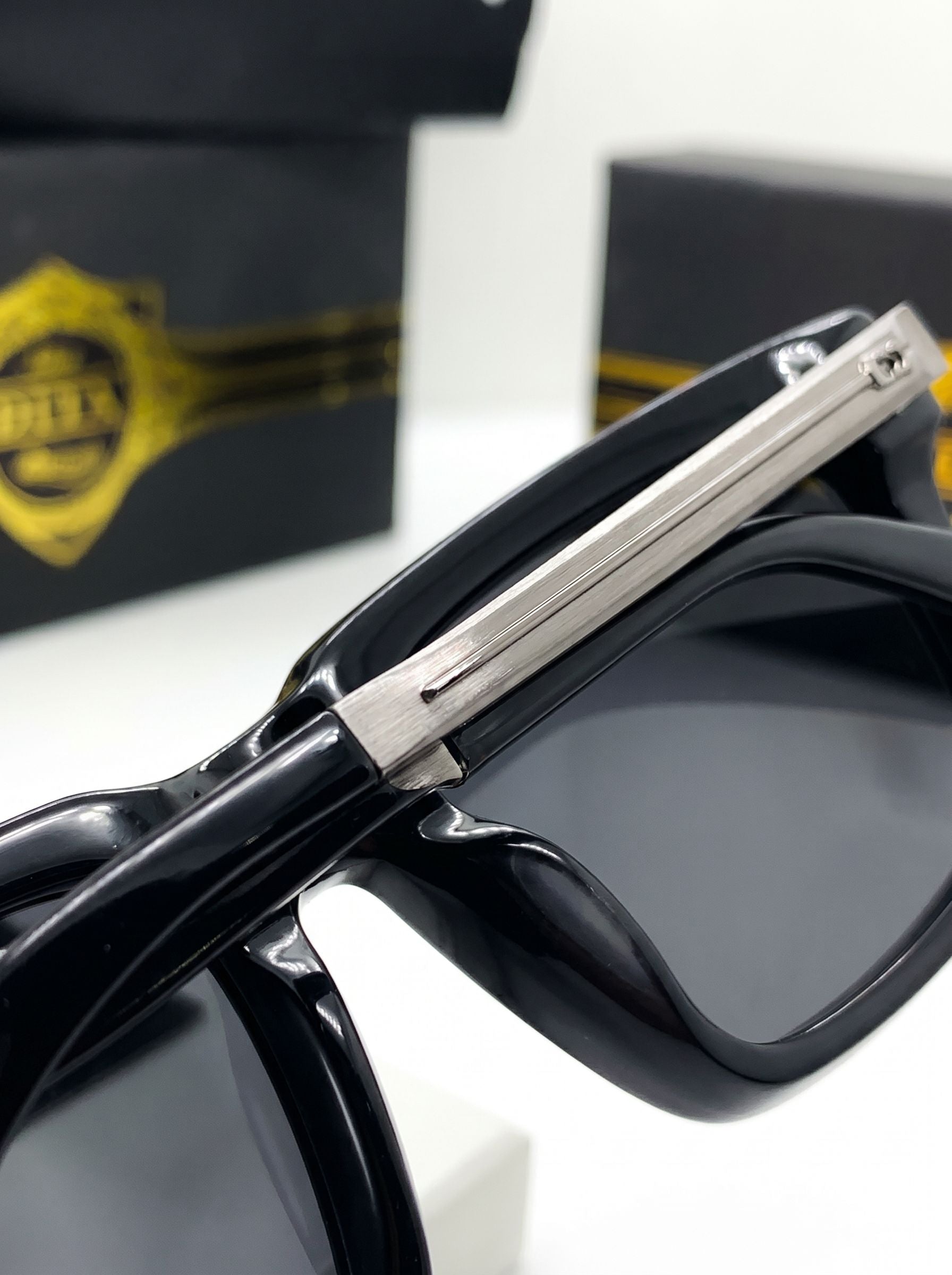 Luxury-inspired oversized sunglasses with elegant metallic side arms