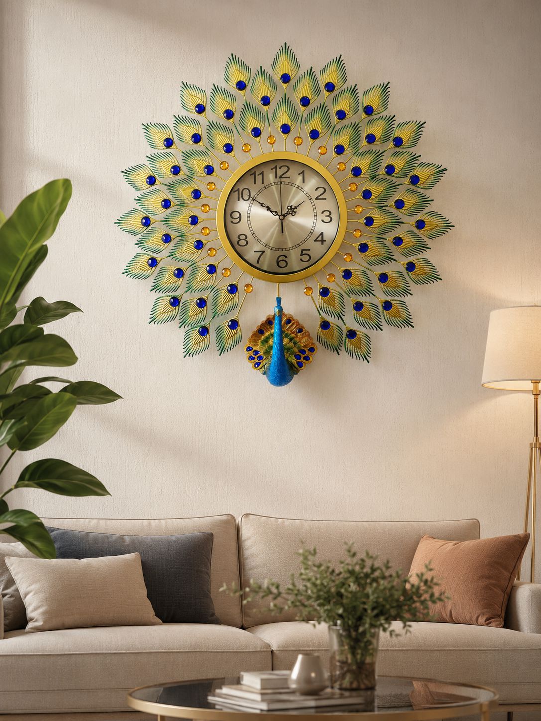Luxury peacock metal and ceramic wall clock with blue crystal accents mounted on elegant wall