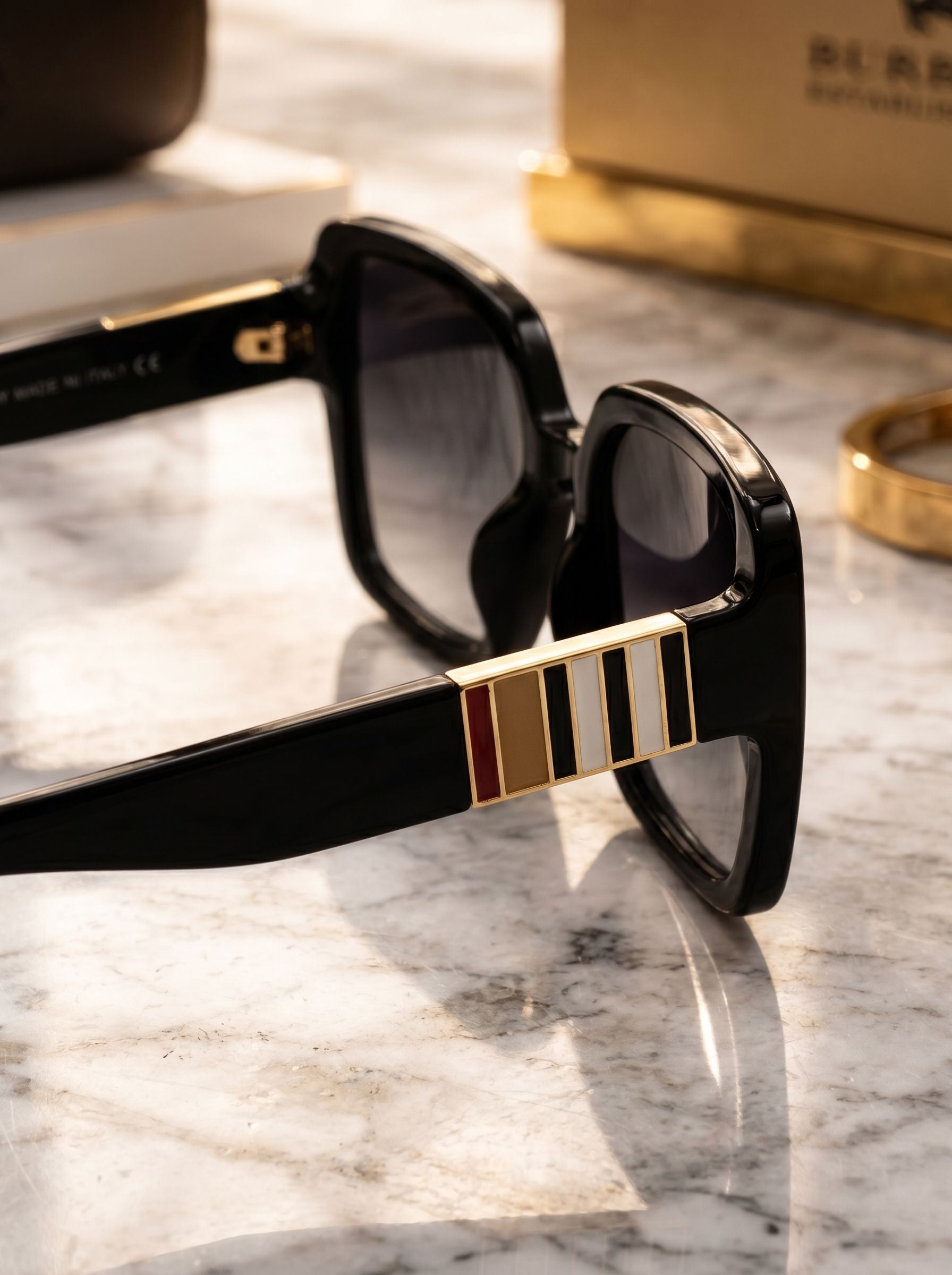 Luxury side arm detail shot of oversized fashion sunglasses for women