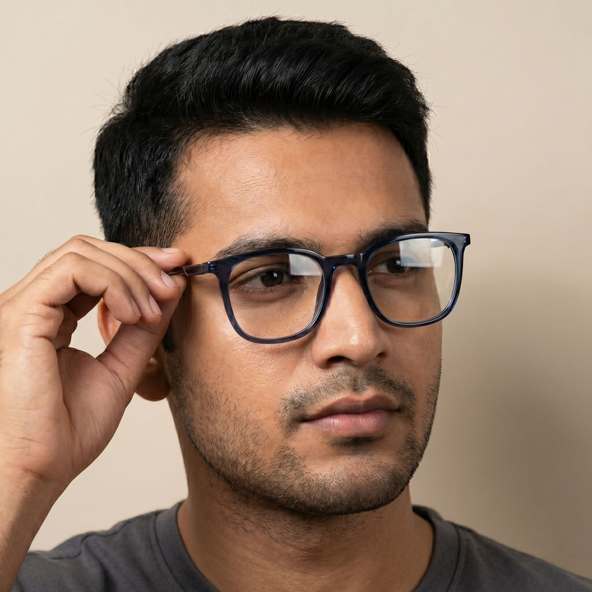 Male model wearing midnight blue transparent eyeglasses