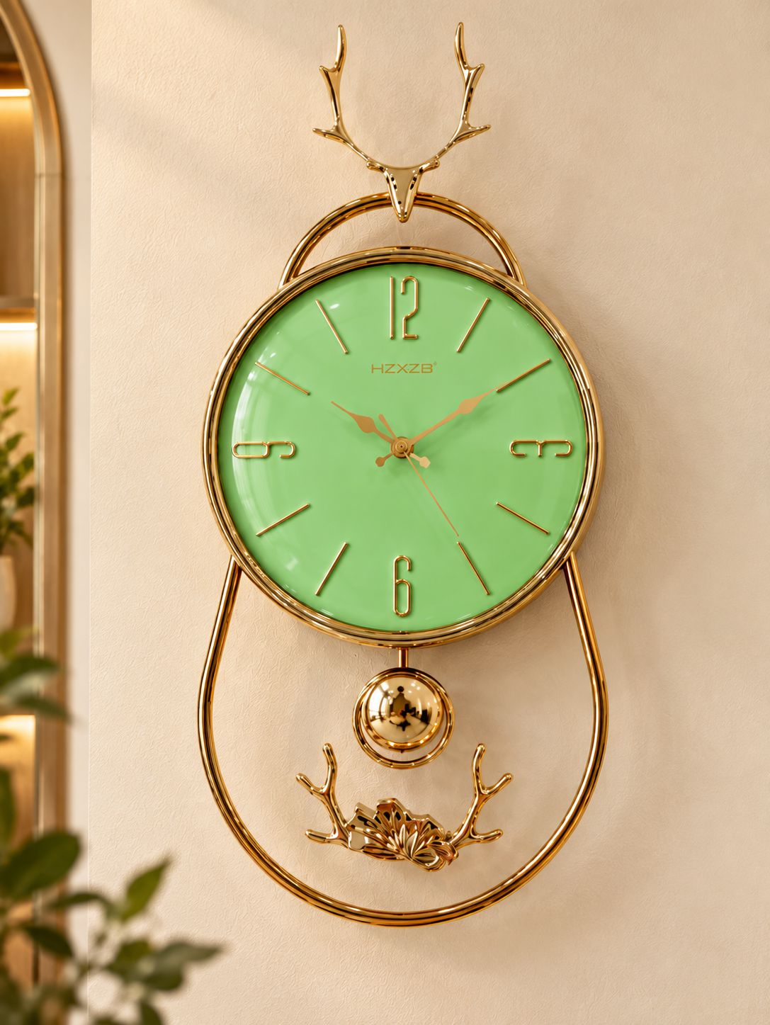 FunkyTradition Reindeer Pendulum Wall Clock – Gold Decorative Wall Clock with Working Pendulum | White, Blue & Green