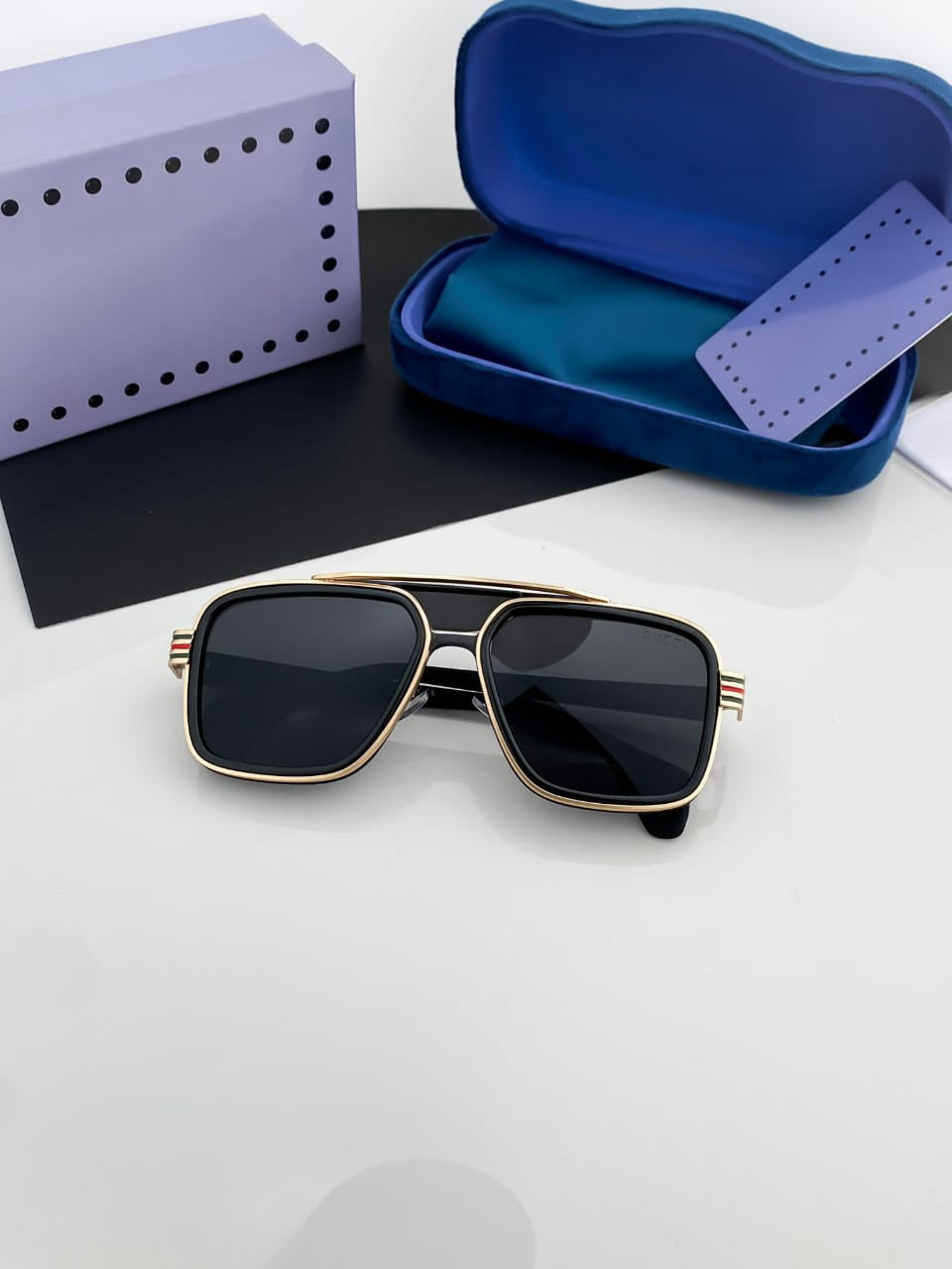 Overhead view of the luxury square aviator sunglasses, highlighting the double bridge and the sleek design