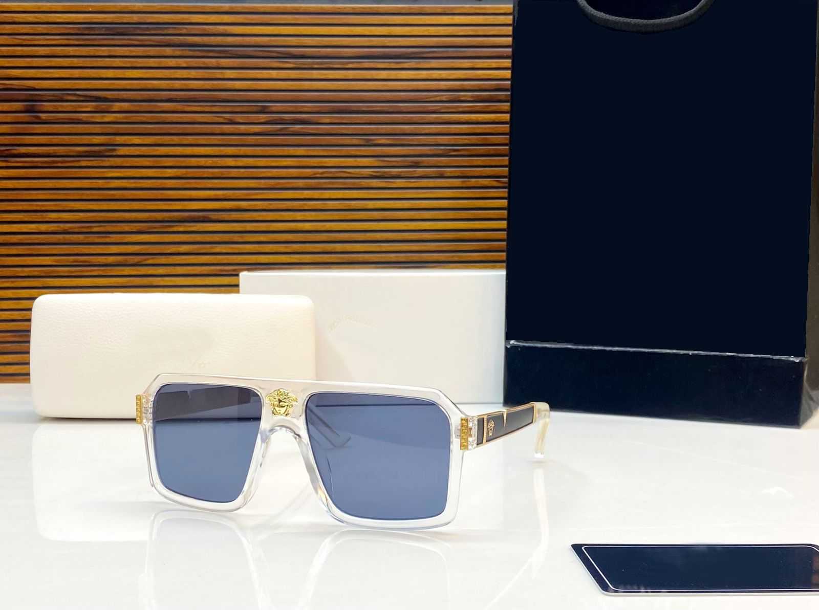 Oversized Clear Frame Square Glasses with Iconic Gold Emblem