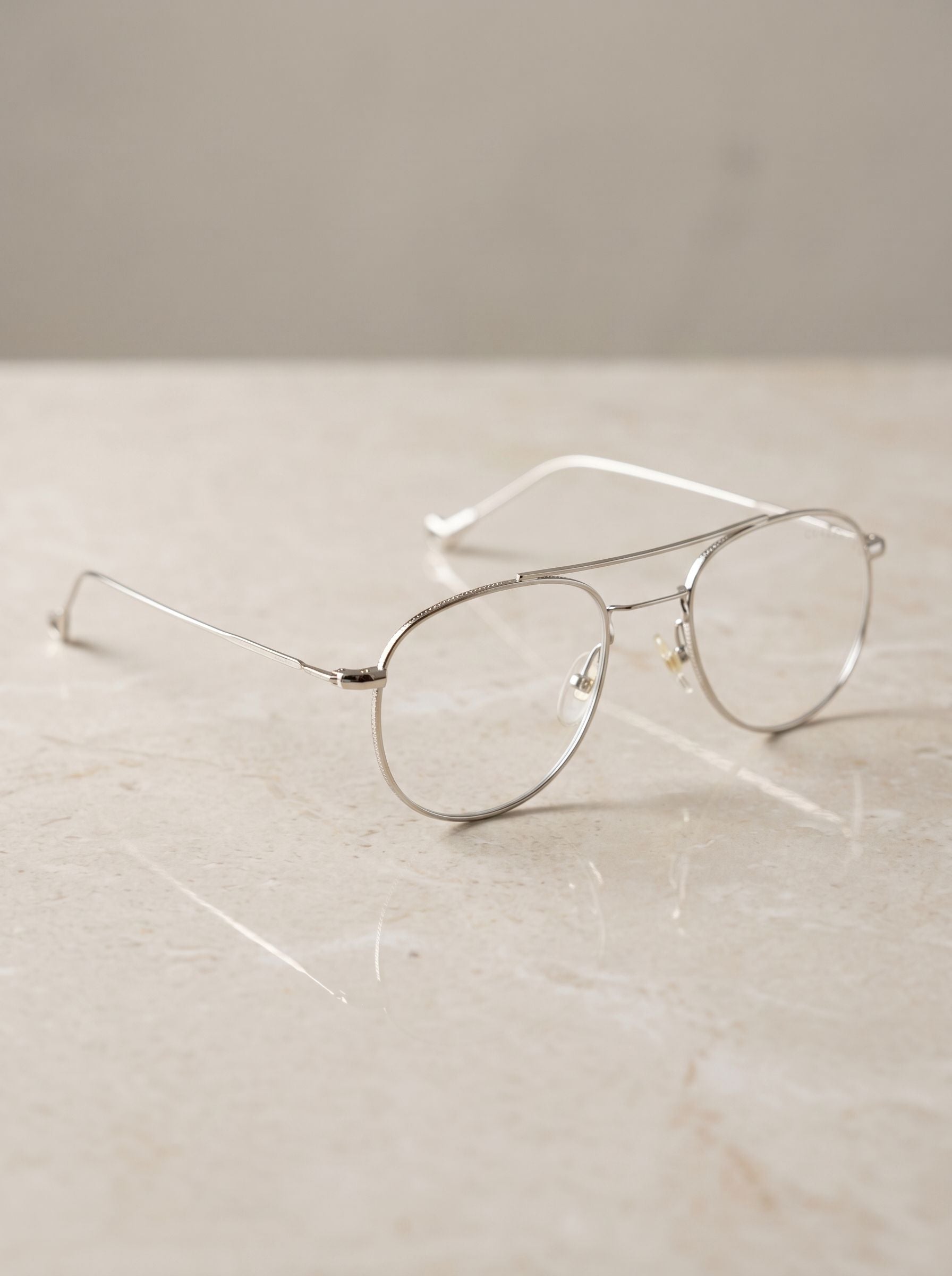 Premium silver metal eyeglasses frame with minimalist Korean-inspired design