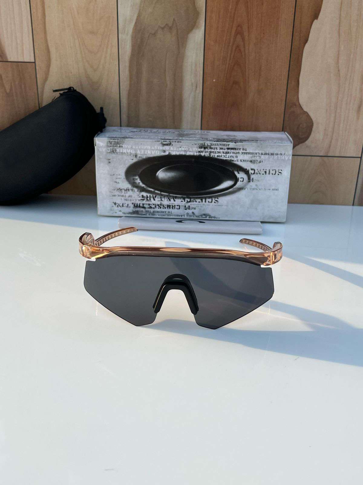 Premium single-lens shield sunglasses with crystal clear frames and UV protection