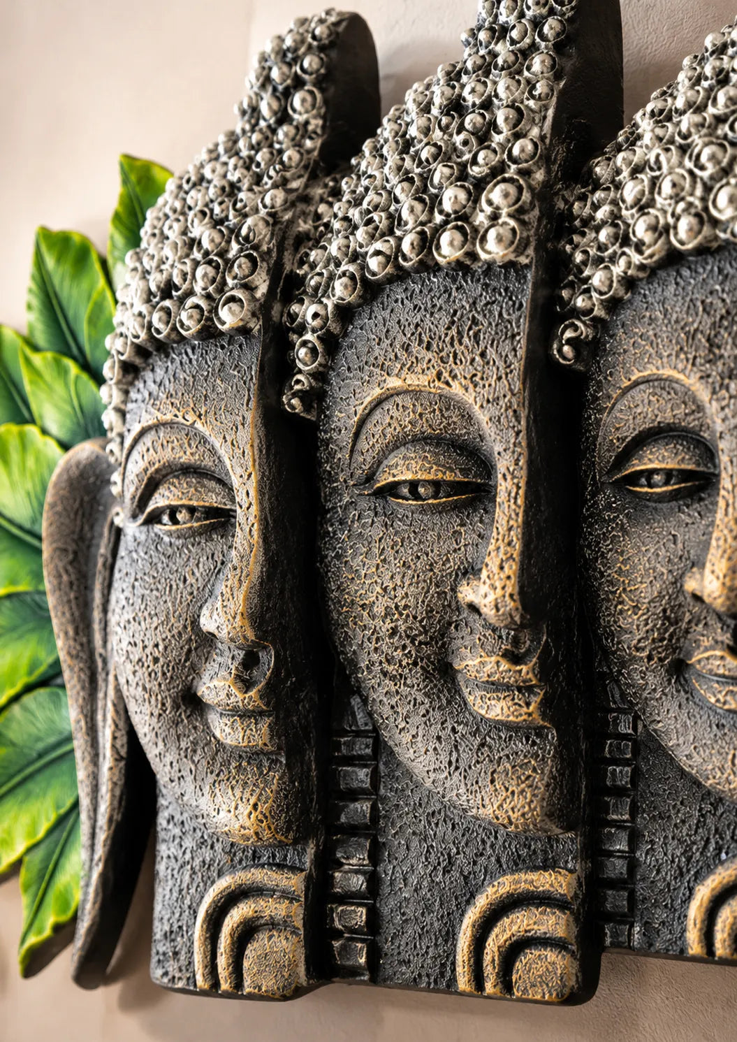 Five-Face Buddha Wall Art with Green Leaf Accents – Antique Stone Finish Decorative Wall Sculpture | FunkyTradition