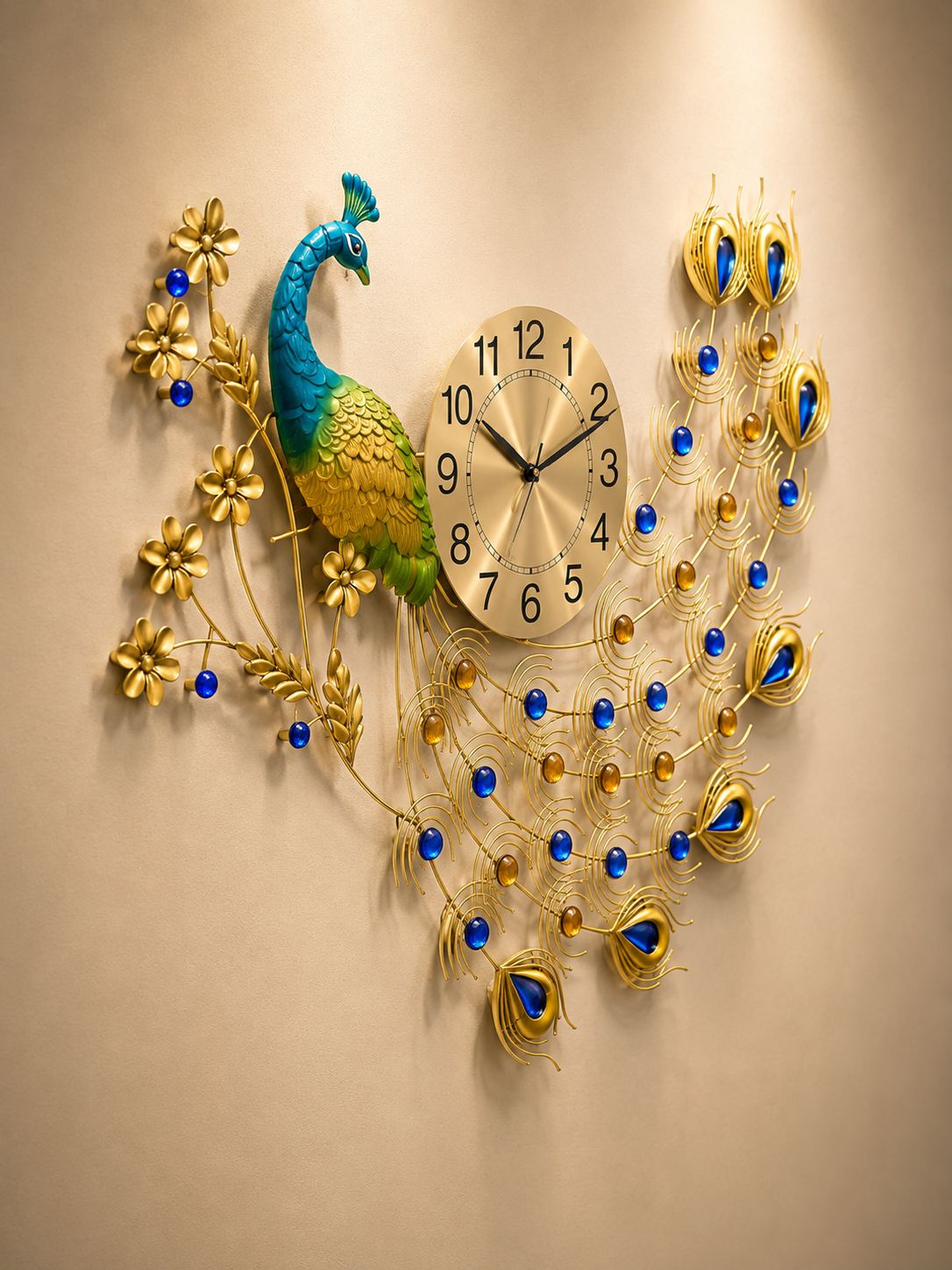 Decorative wall clock with peacock design on a beige wall