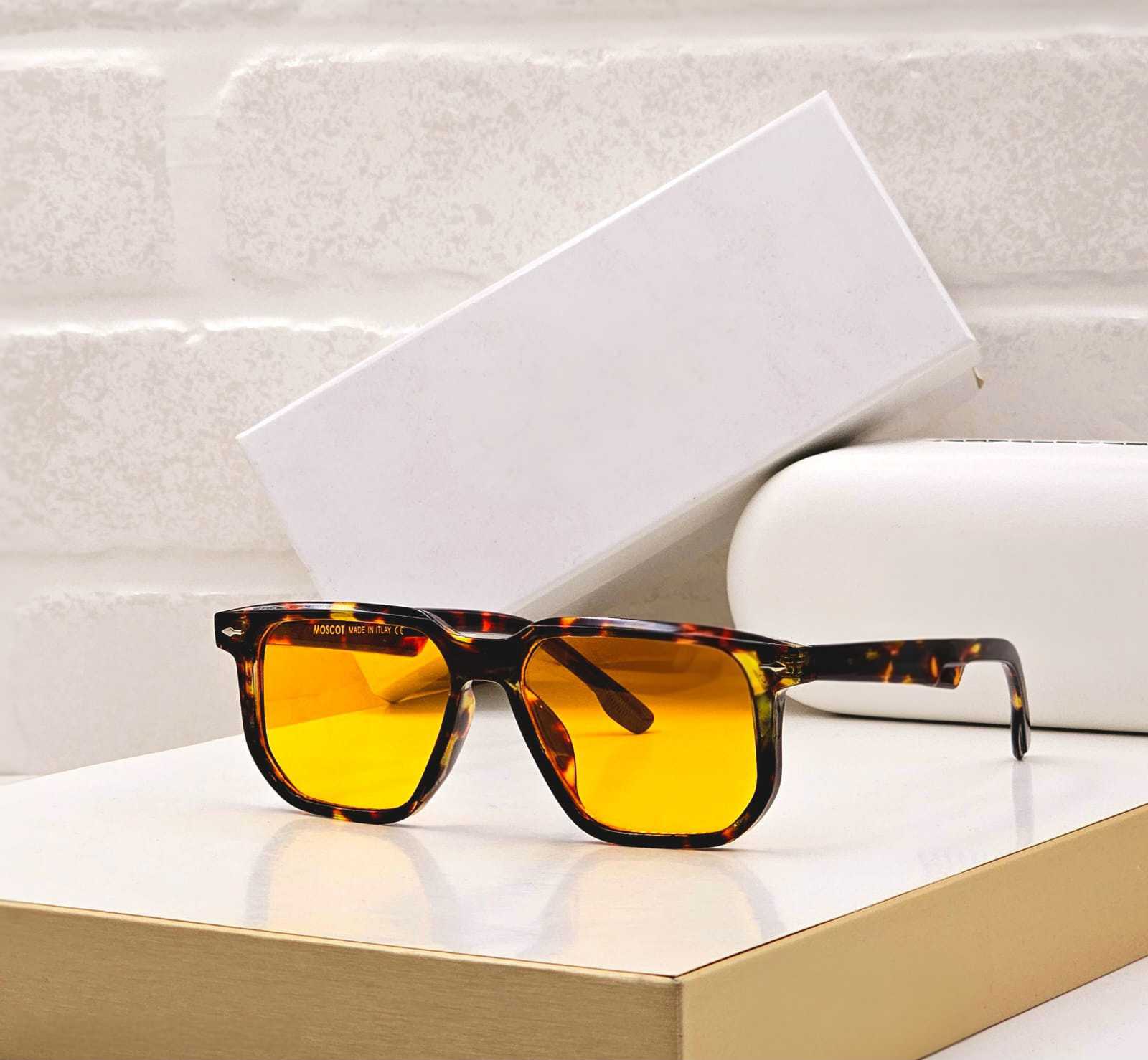 Tortoise shell frame rectangular sunglasses with vibrant yellow lenses