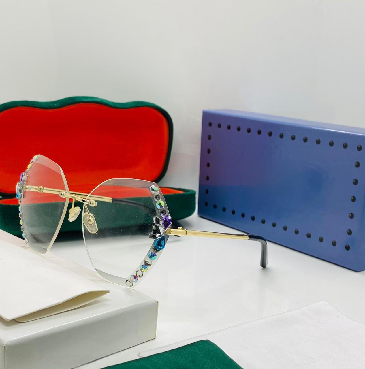 Trending clear/frosted square frame sunglasses with a blue-yellow gradient lens and gold accents.