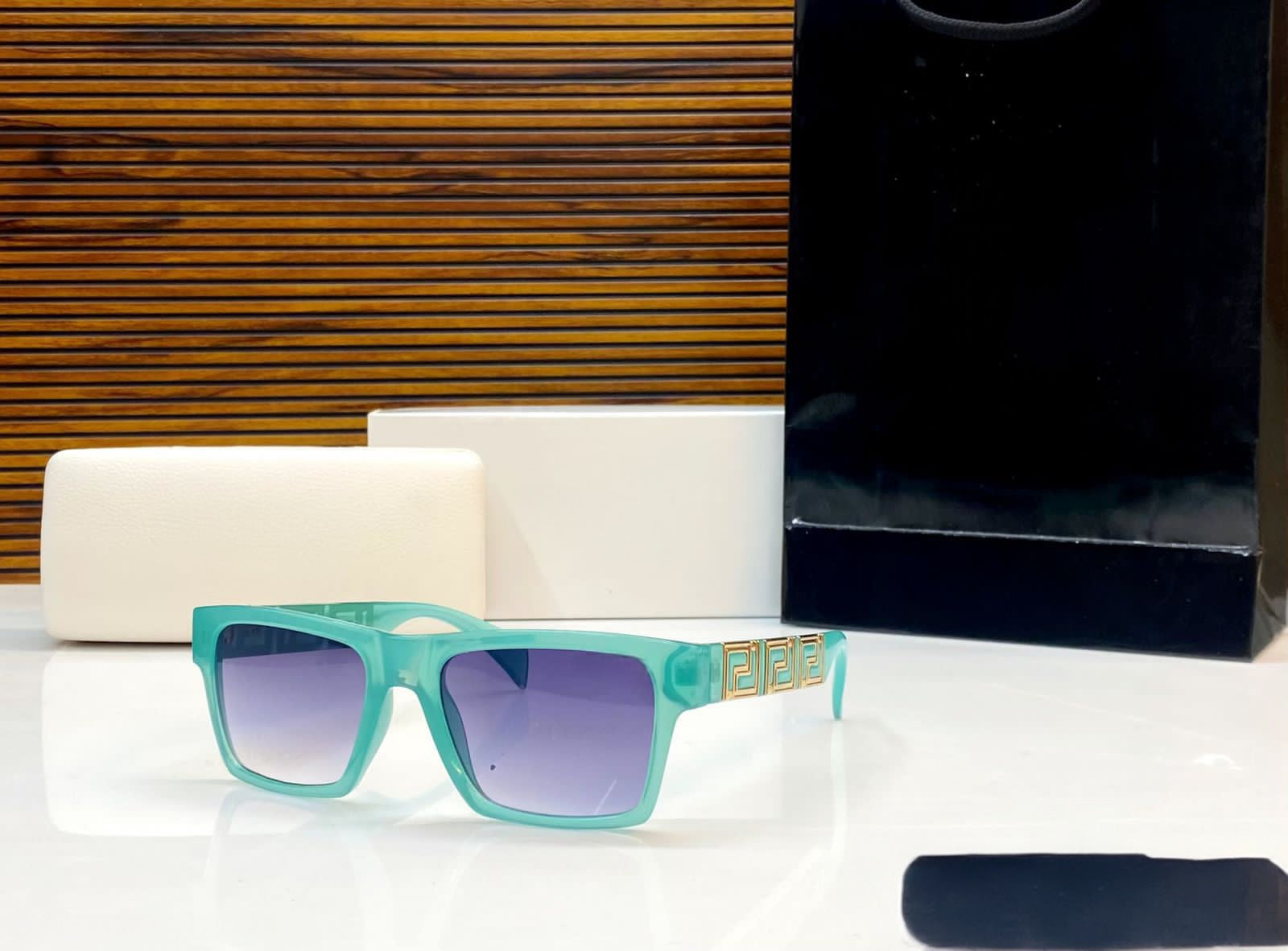 Trendy Aqua Mint Square Sunglasses with Gold Greek Key Detail on Temple and Purple Gradient Lens