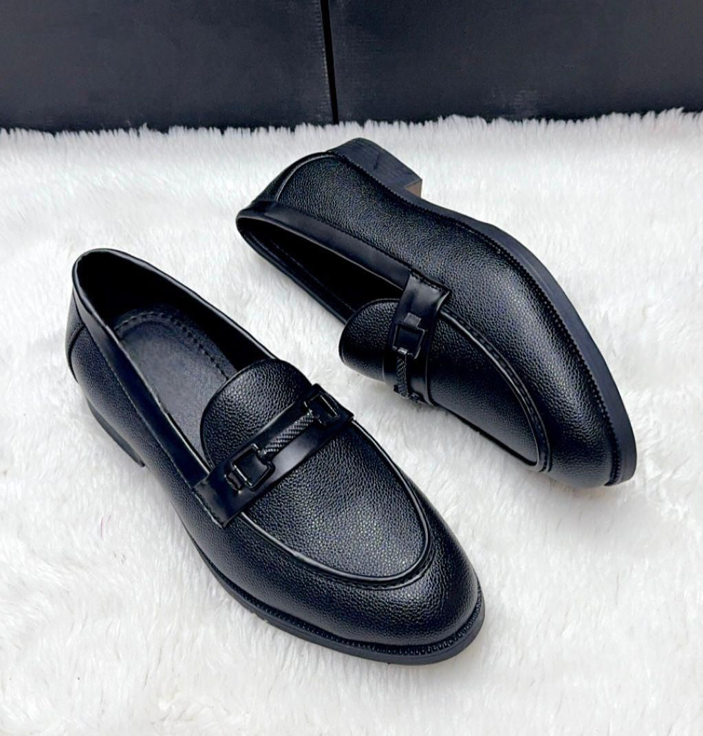 View of the durable Black TPR sole of the men's loafer shoe.