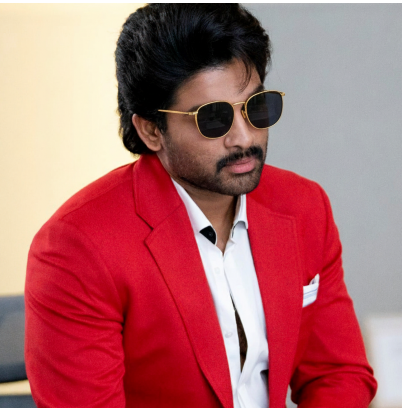 showing the bold round sunglasses next to South Indian star Allu Arjun wearing a similar style.