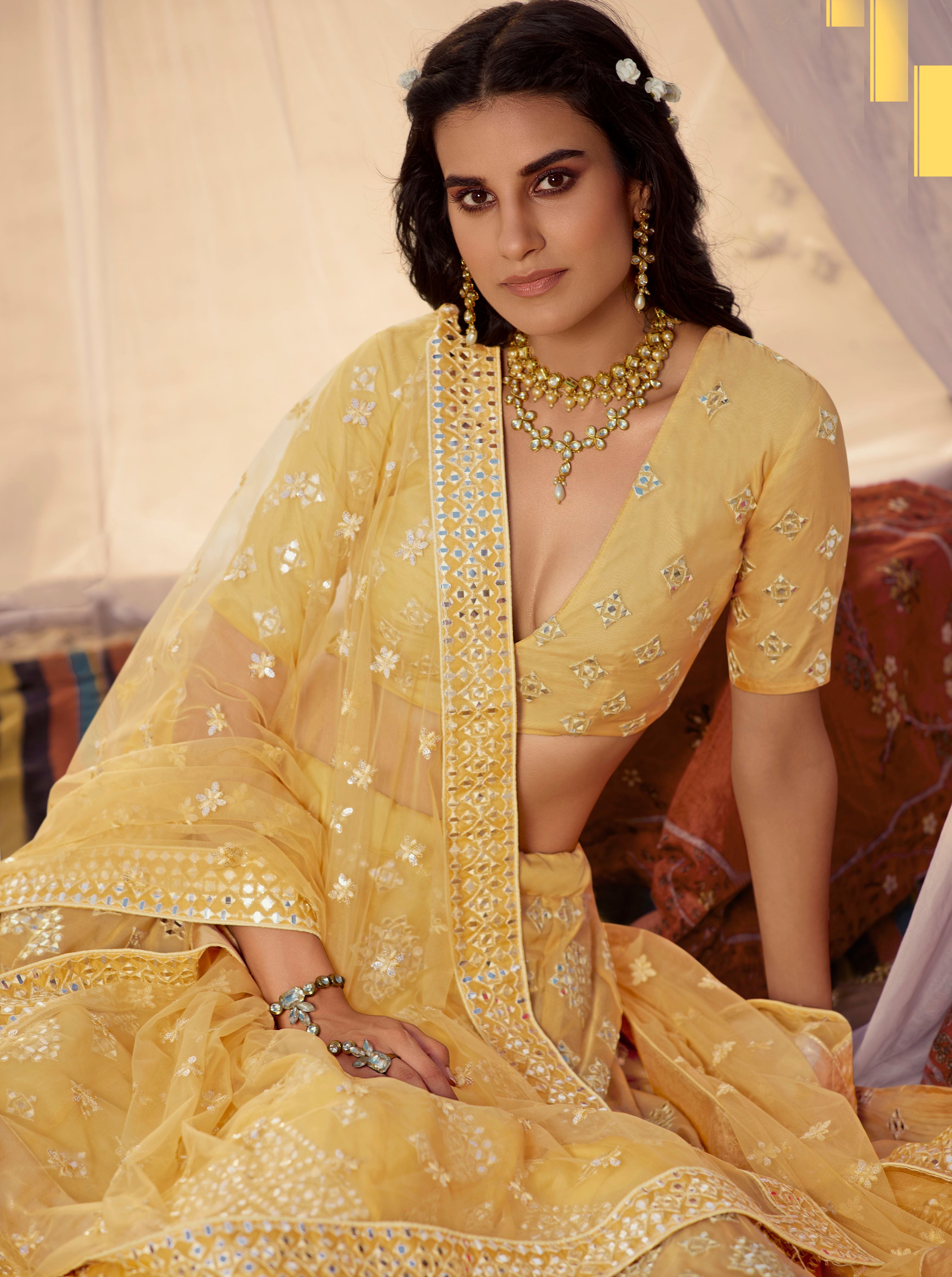 Mustard Yellow Color Mirror Work Heavy Embroidered Organza Semi-Stitched Lehenga Choli - FunkyTradition